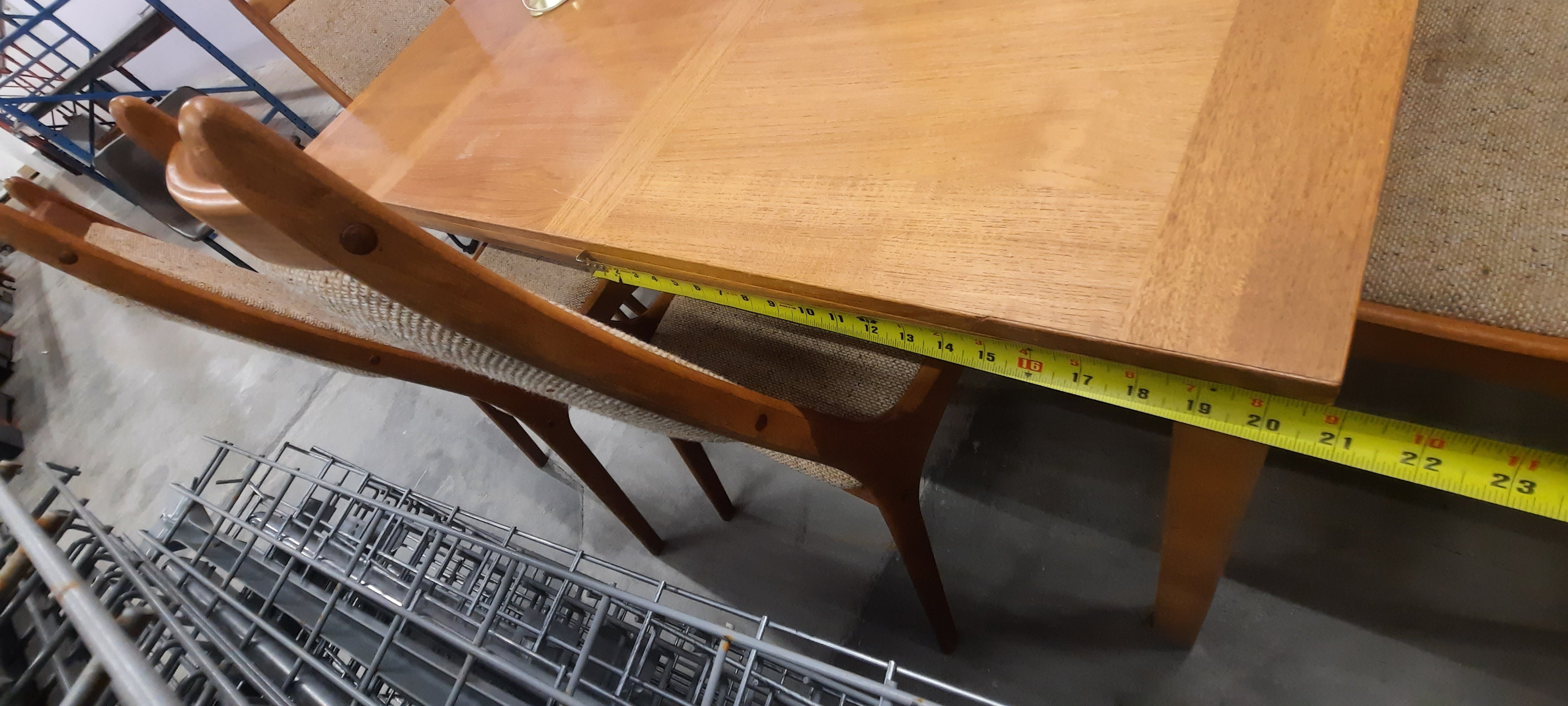 MCM dining set with pull out leafs on both ends