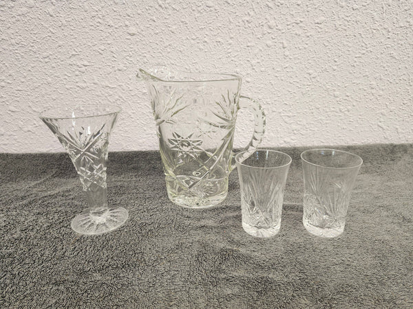 Anchor Hockings pitcher. Price is for all 4 pieces