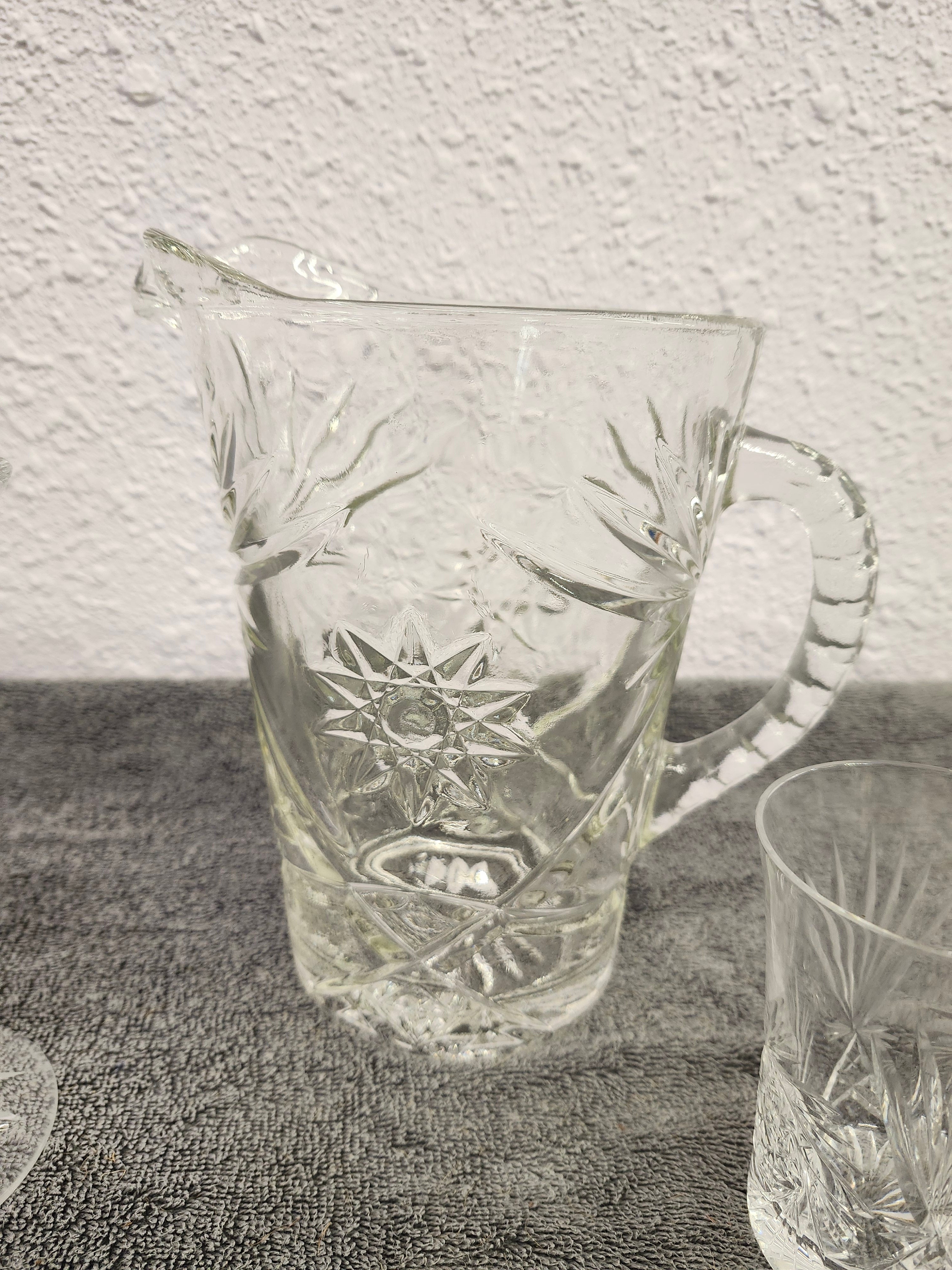 Anchor Hockings pitcher. Price is for all 4 pieces