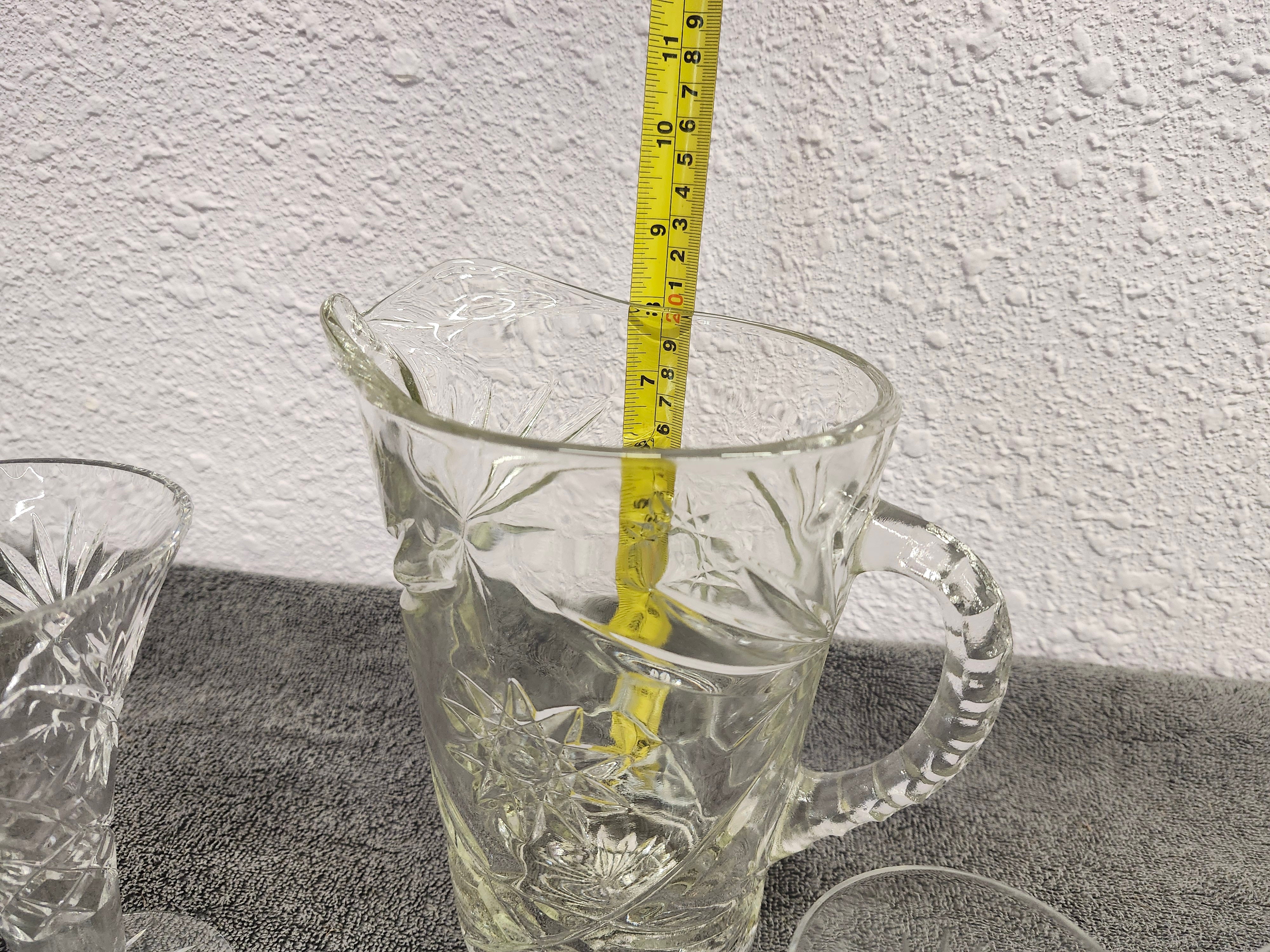 Anchor Hockings pitcher. Price is for all 4 pieces