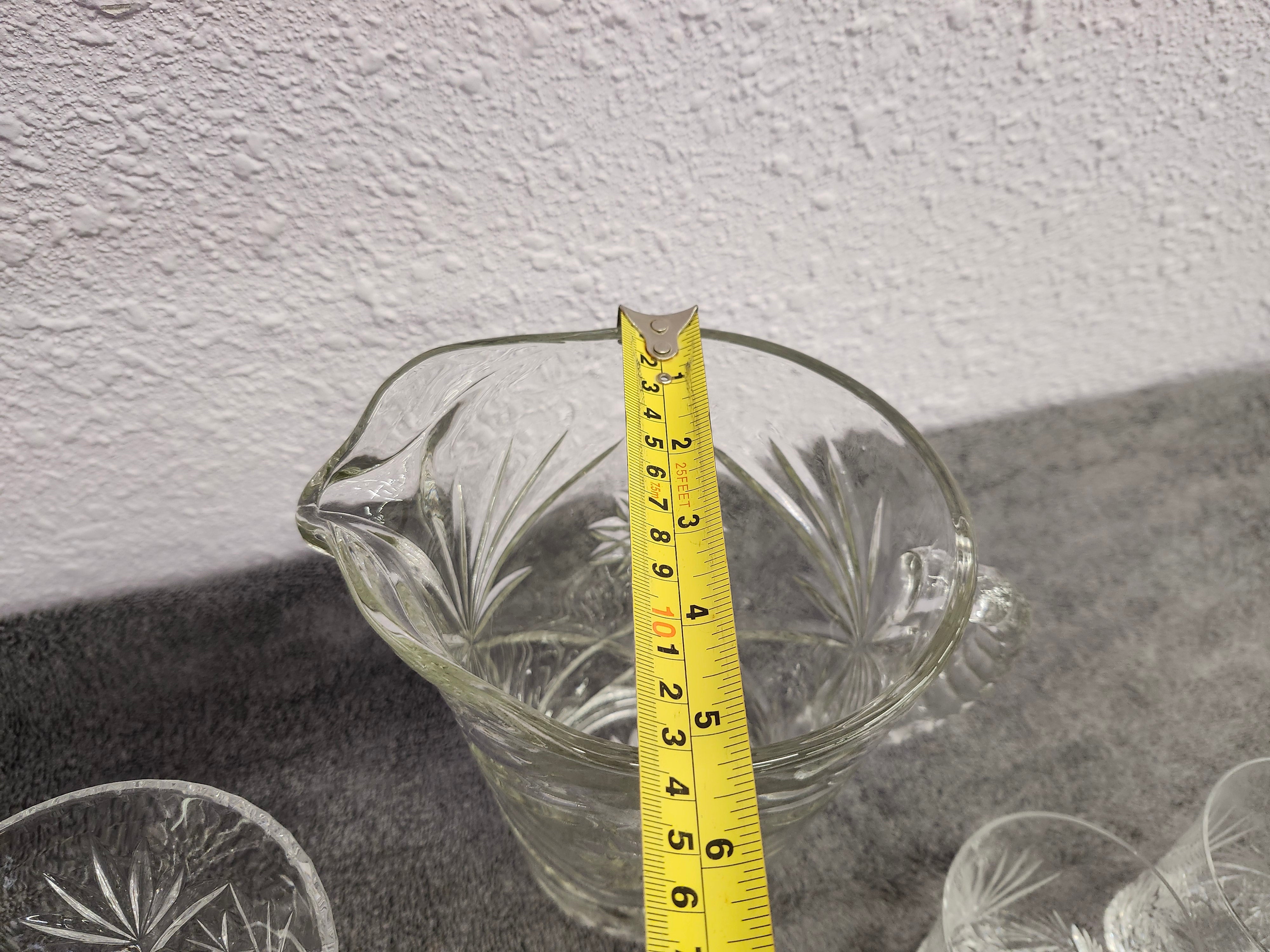 Anchor Hockings pitcher. Price is for all 4 pieces