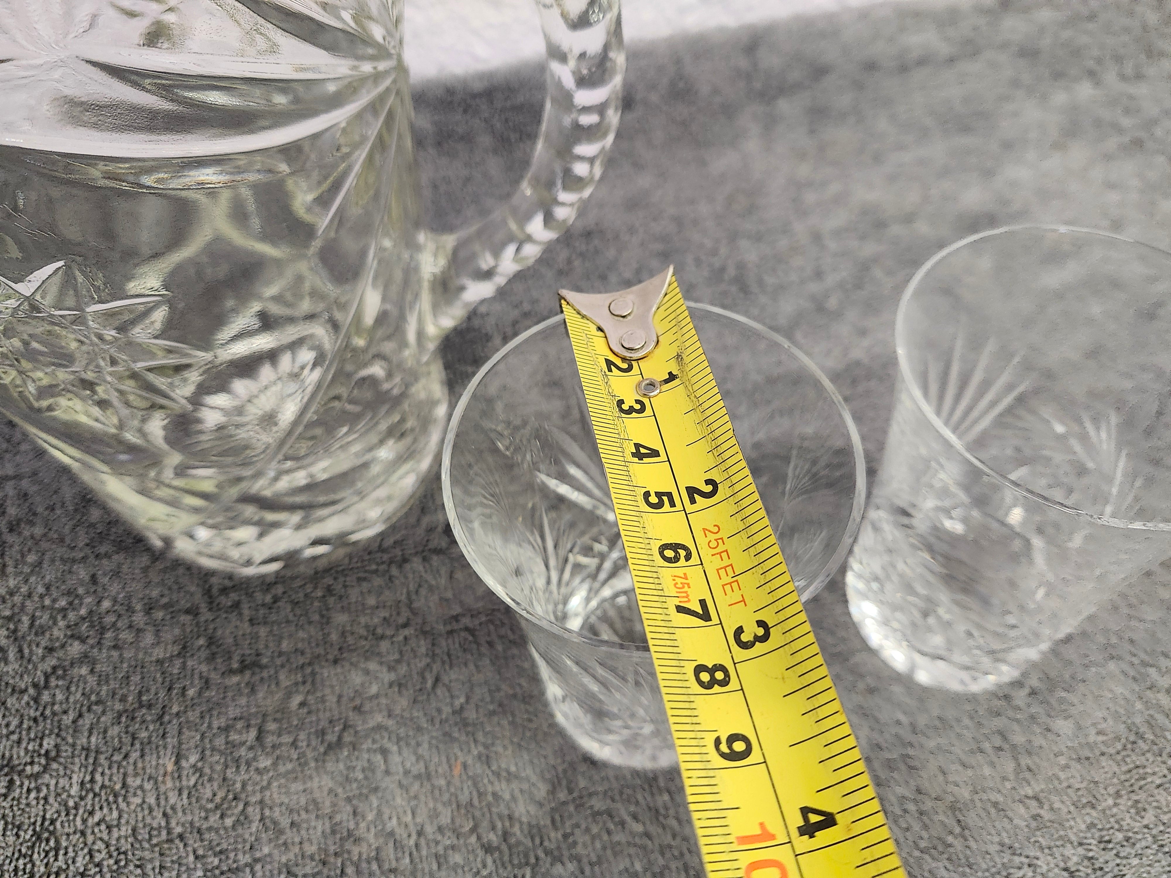 Anchor Hockings pitcher. Price is for all 4 pieces