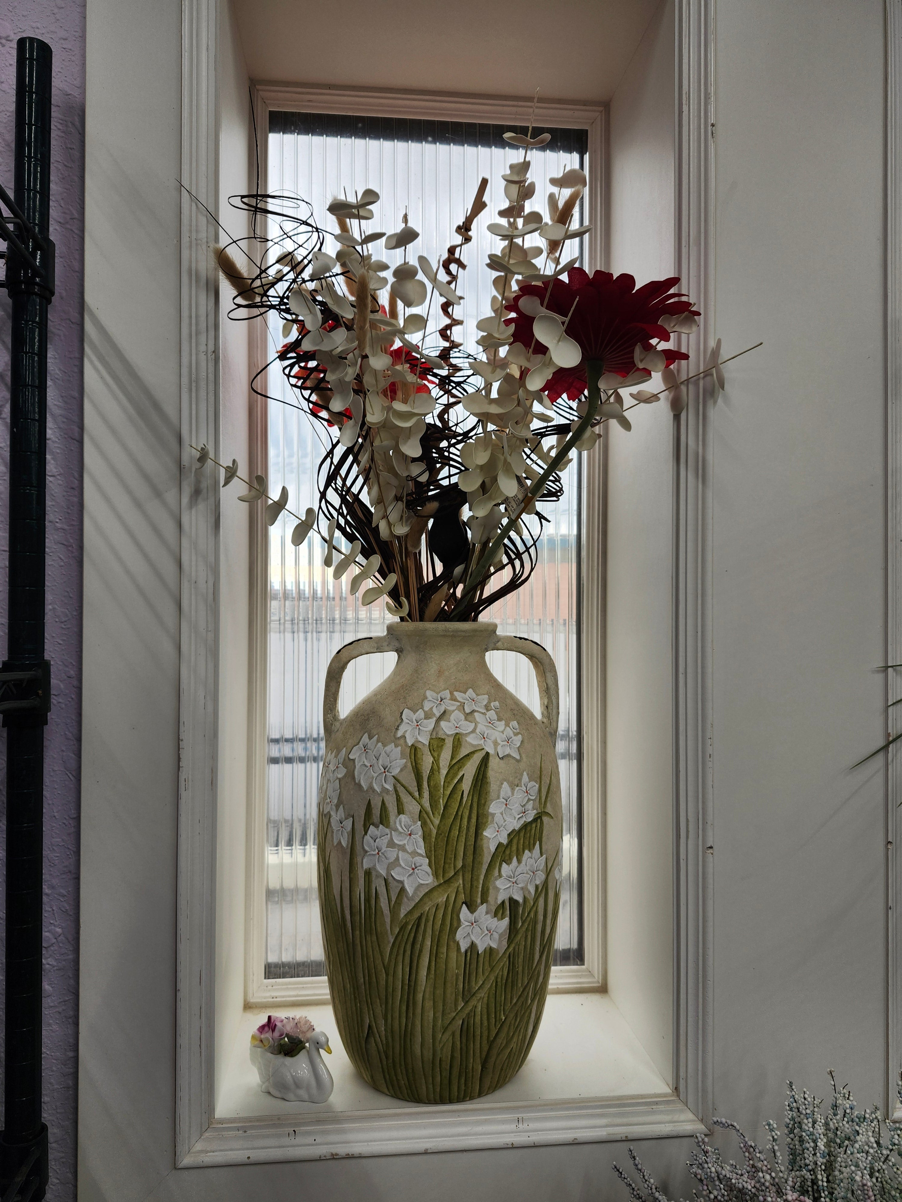 Large pottery vase & fake flowers