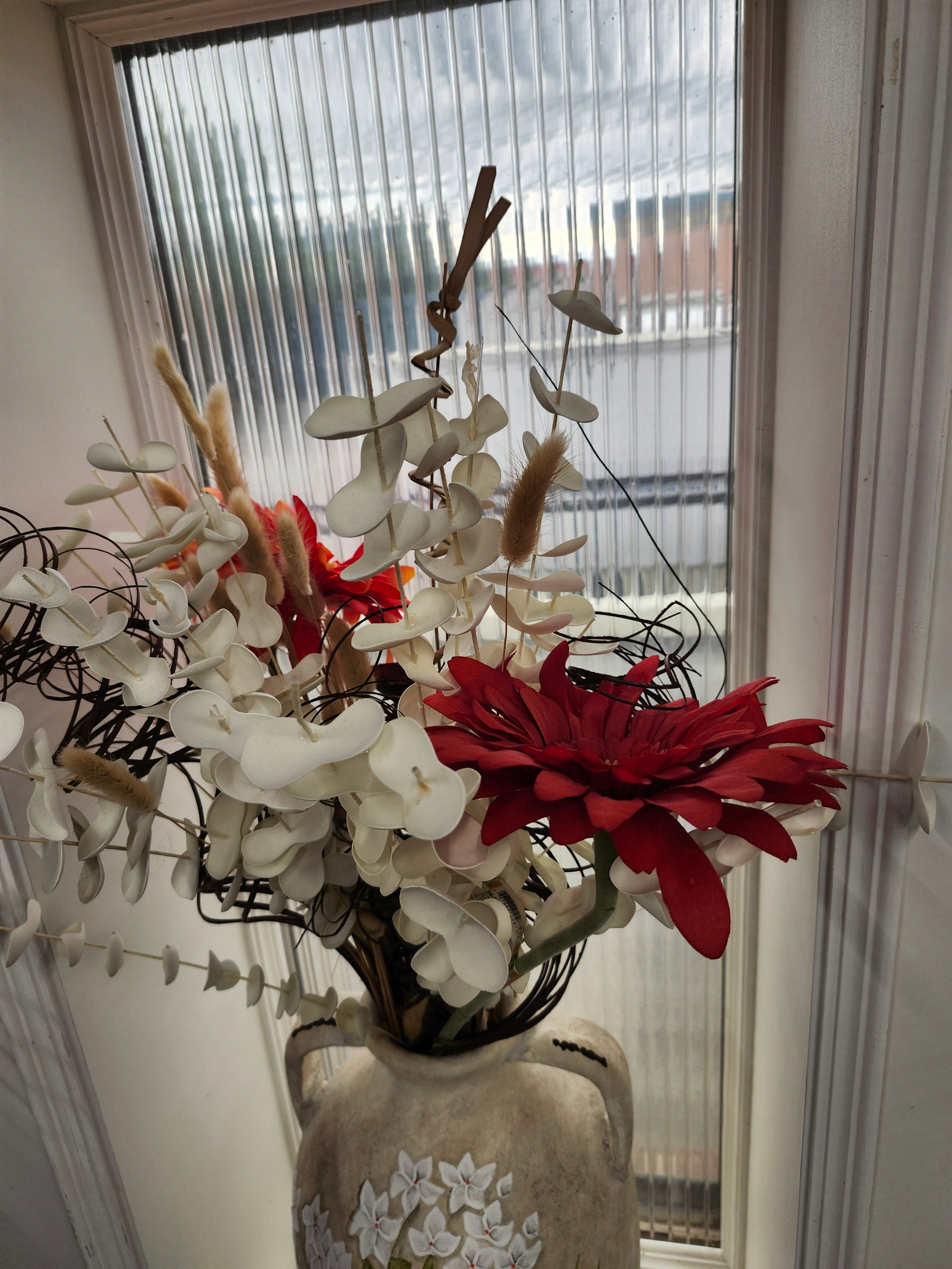 Large pottery vase & fake flowers
