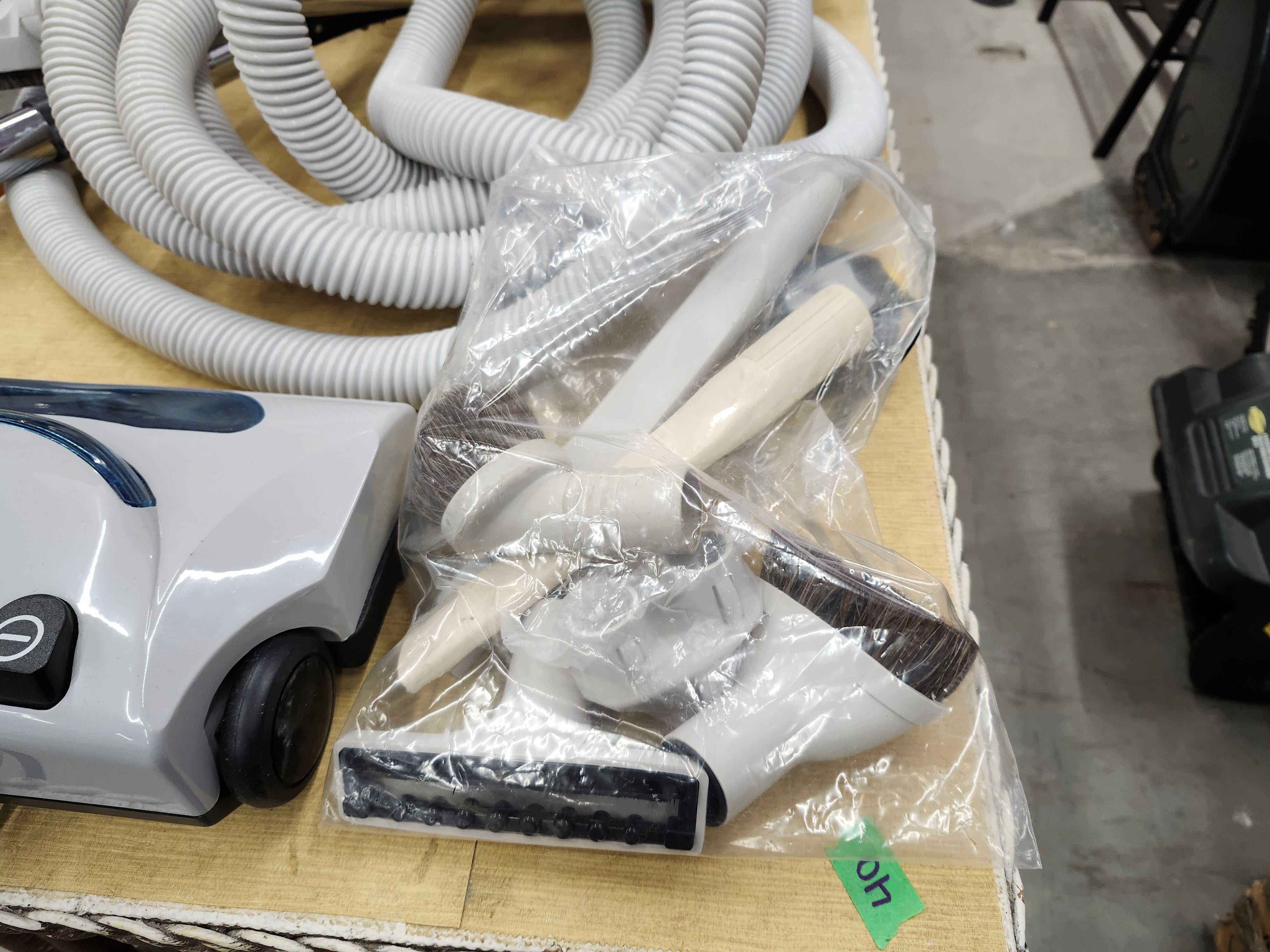 Central vacuum hose and attachments