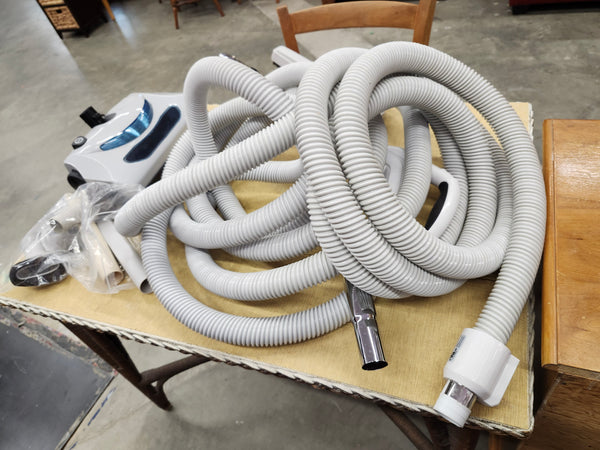 Central vacuum hose and attachments