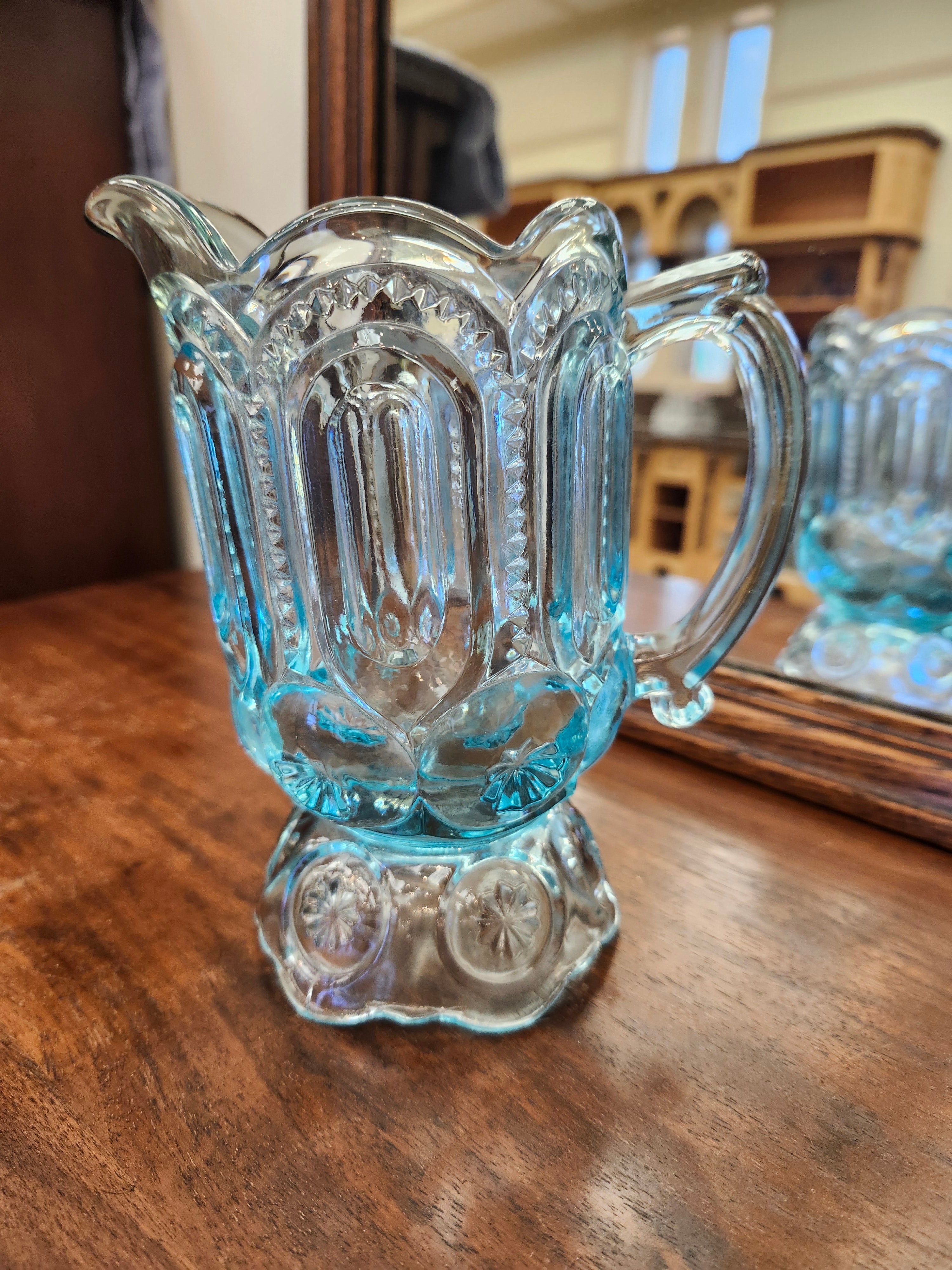 Blue glass creamer jug
