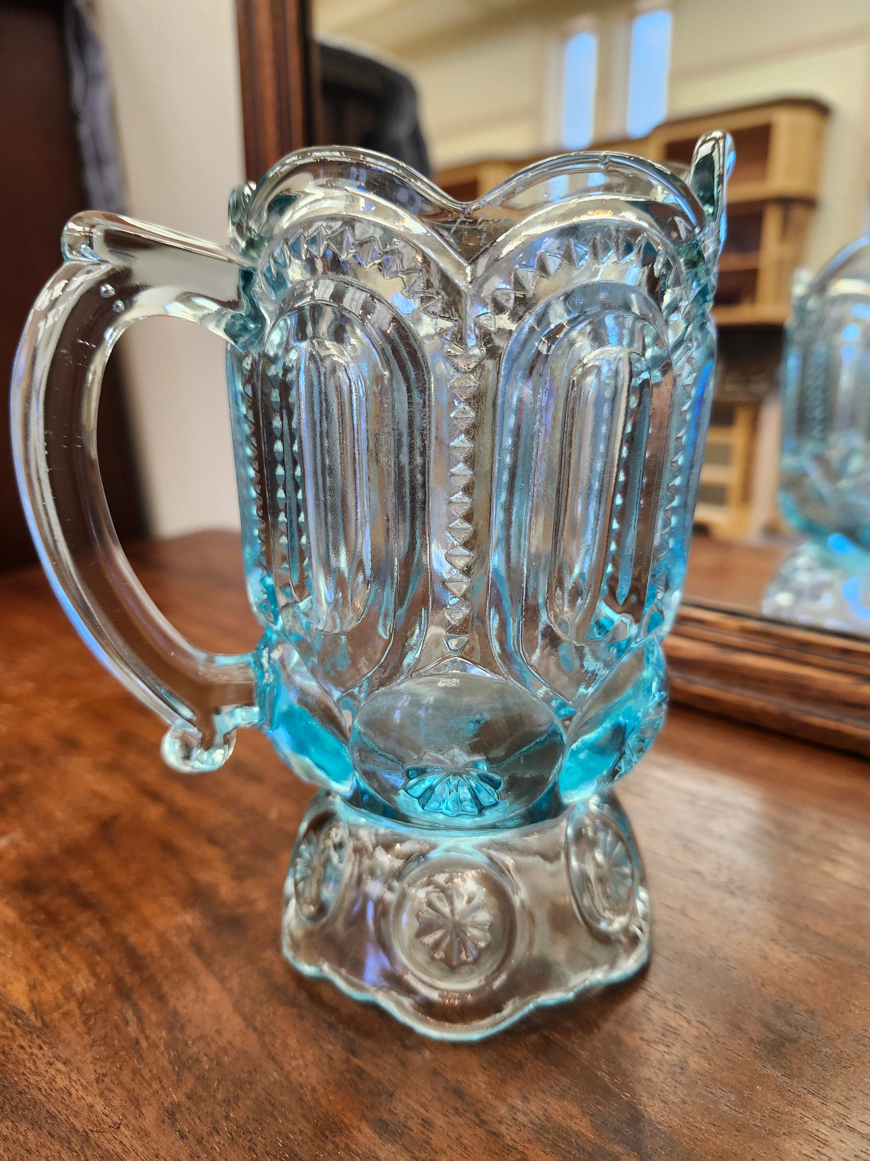Blue glass creamer jug