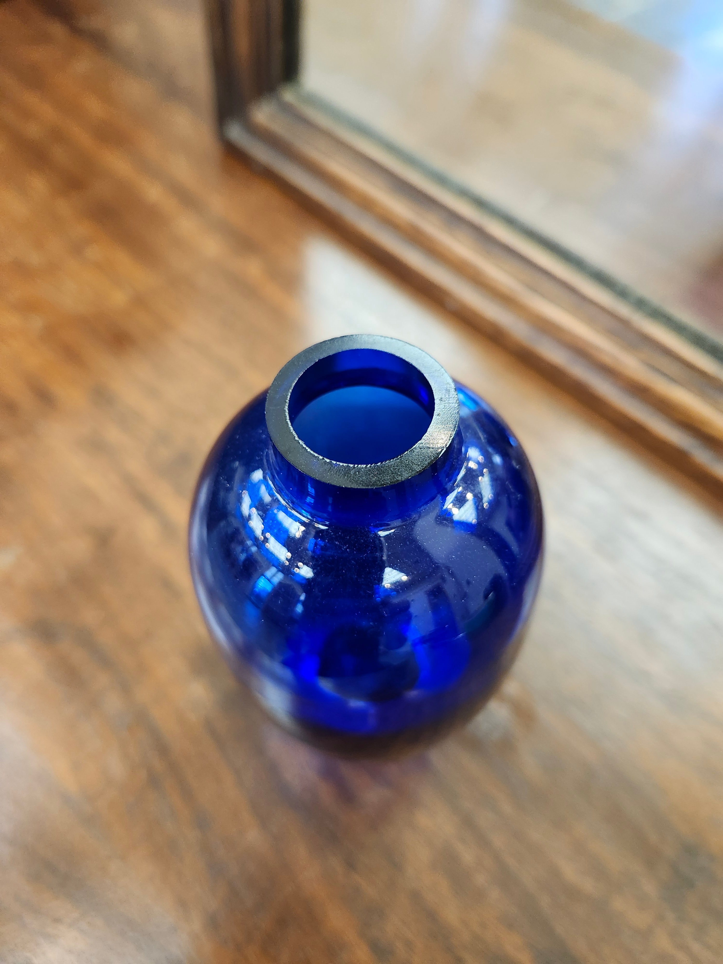 Blue glass bud vase