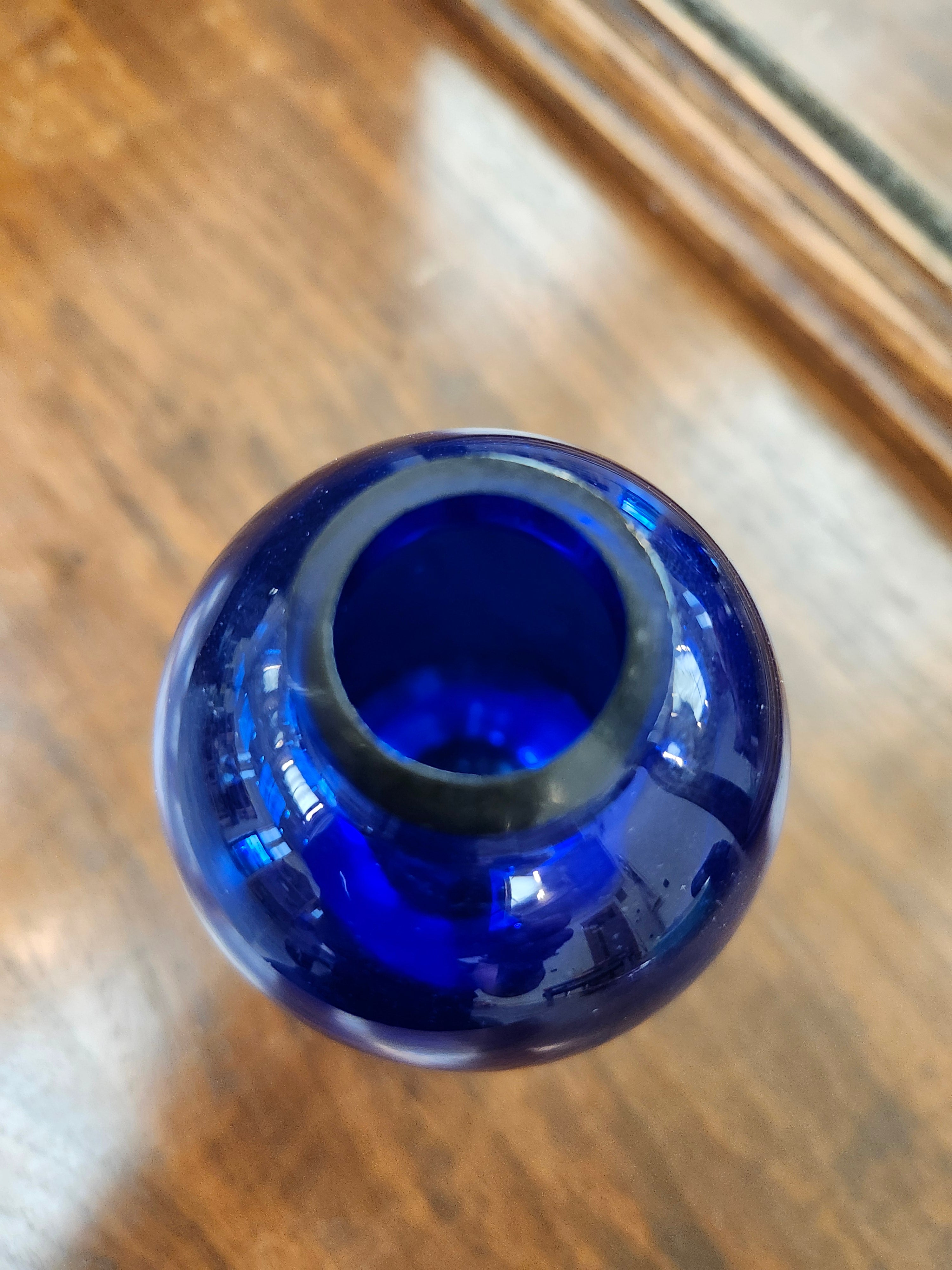 Blue glass bud vase