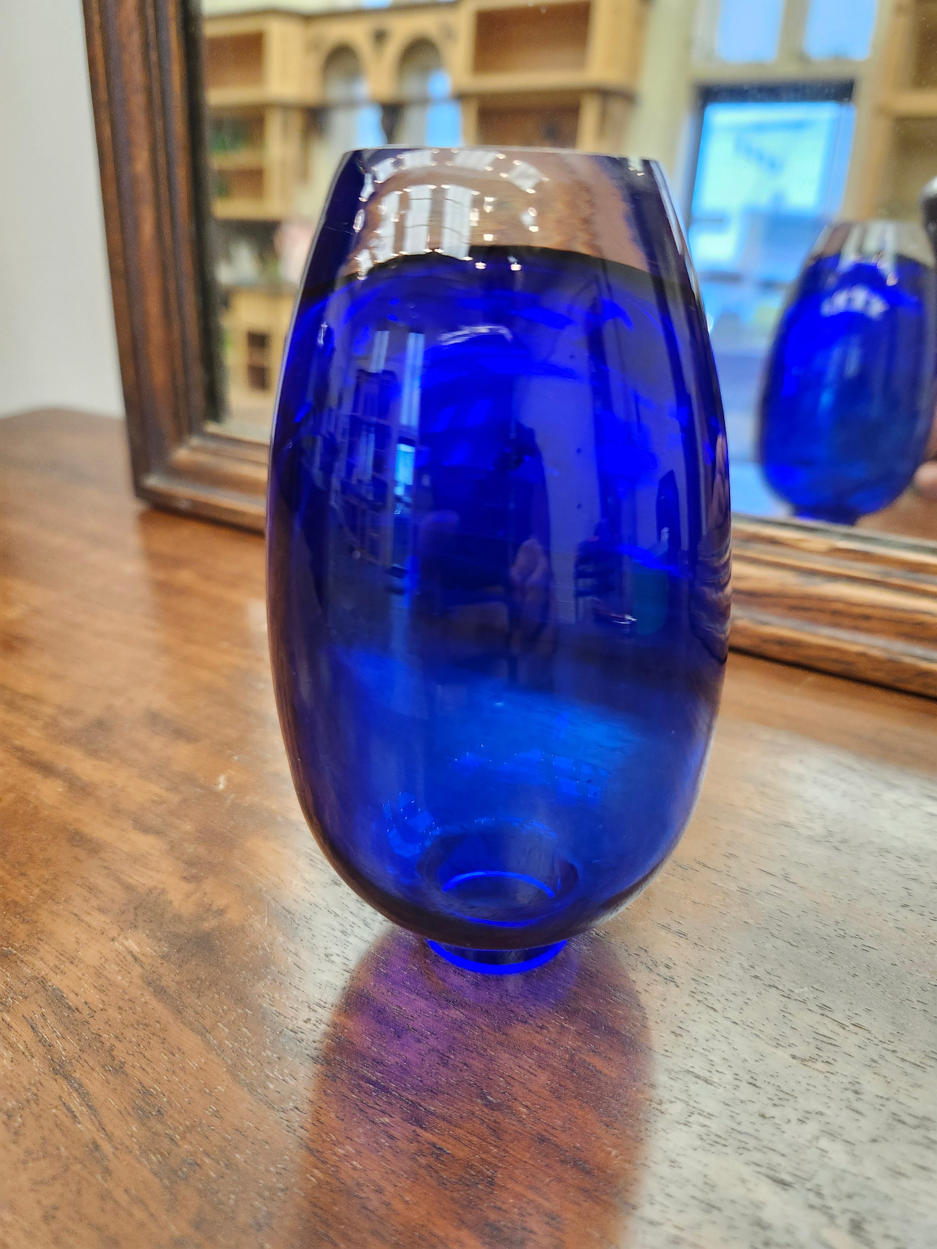 Blue glass bud vase