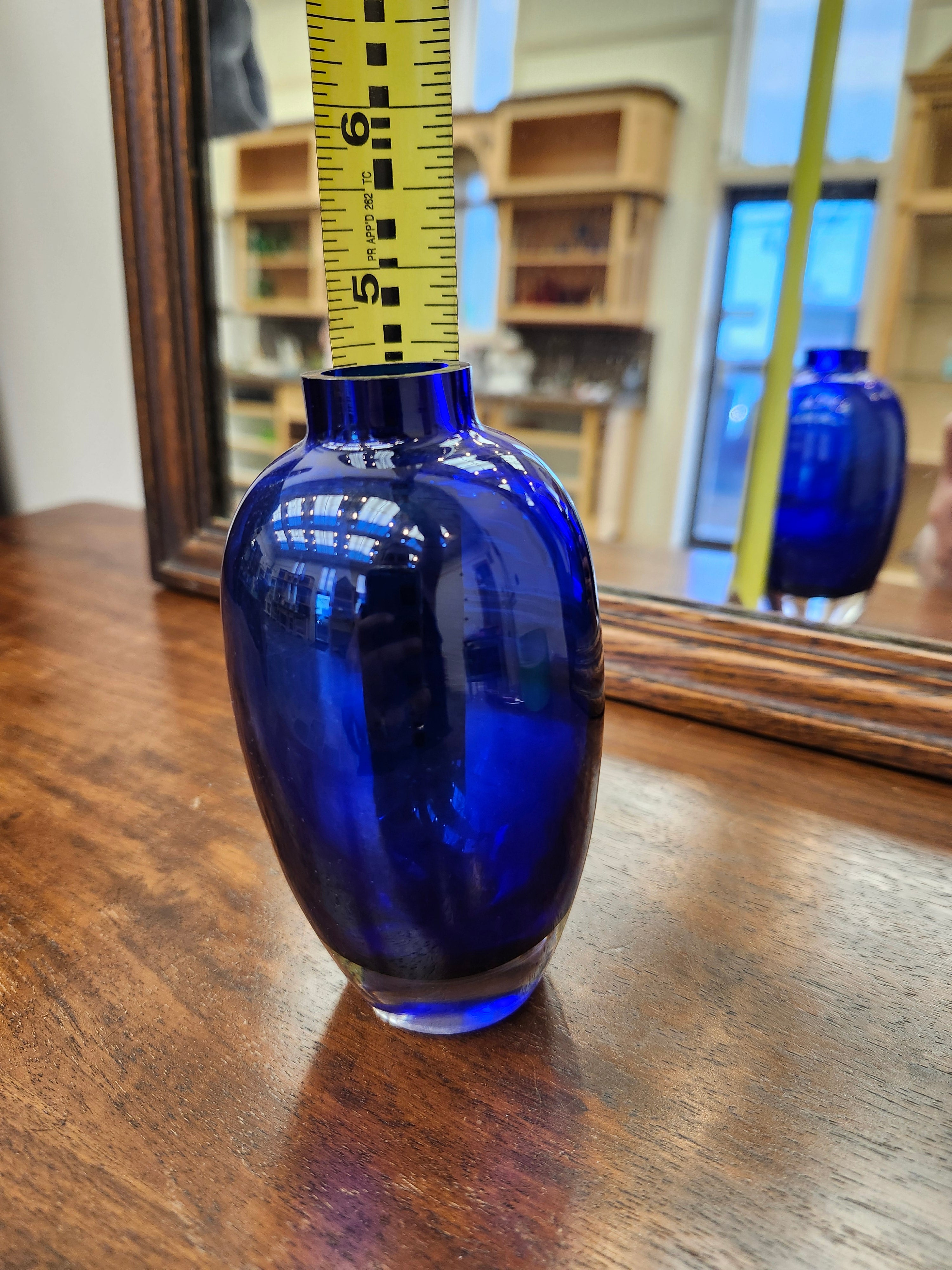 Blue glass bud vase