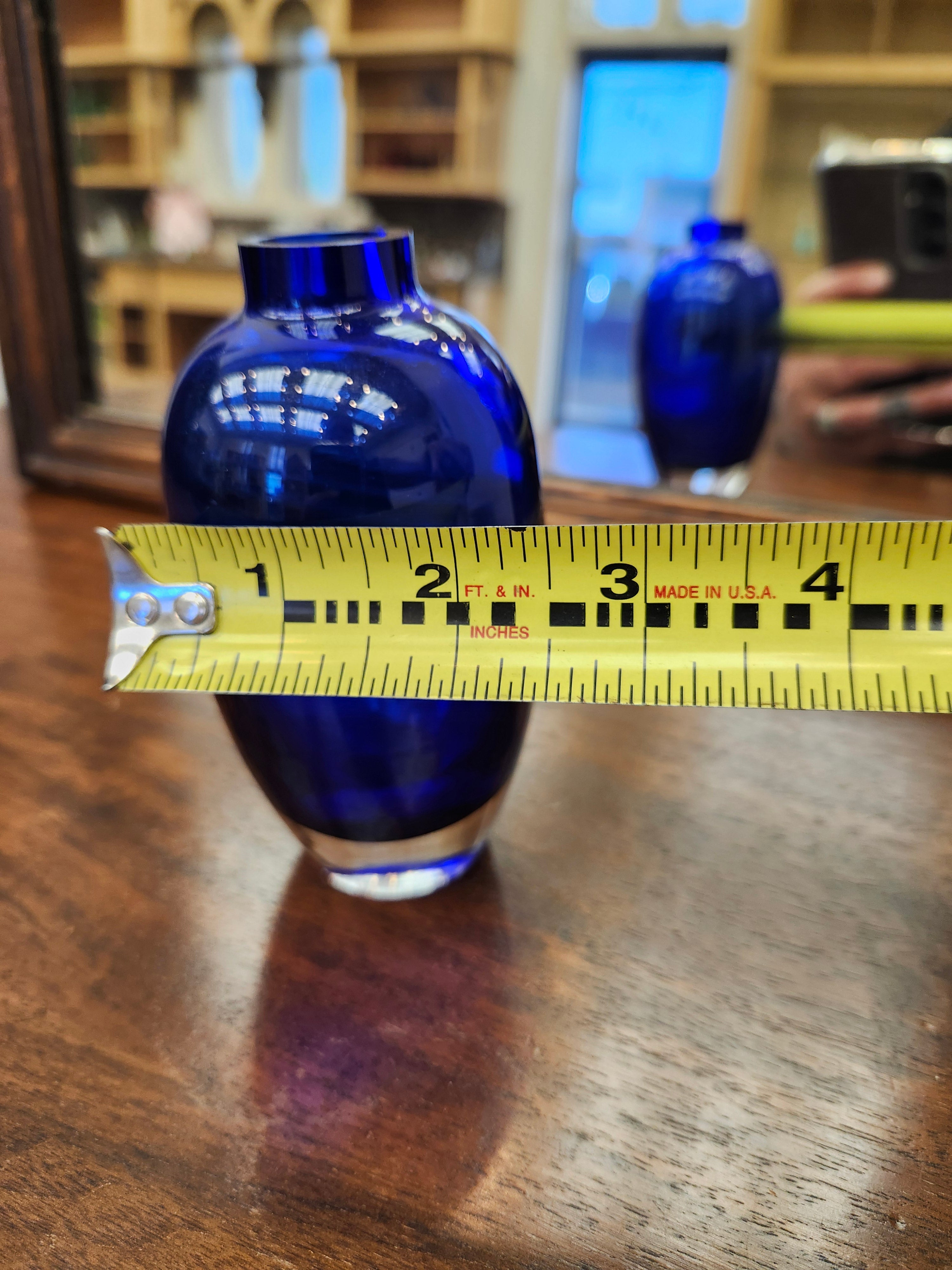 Blue glass bud vase