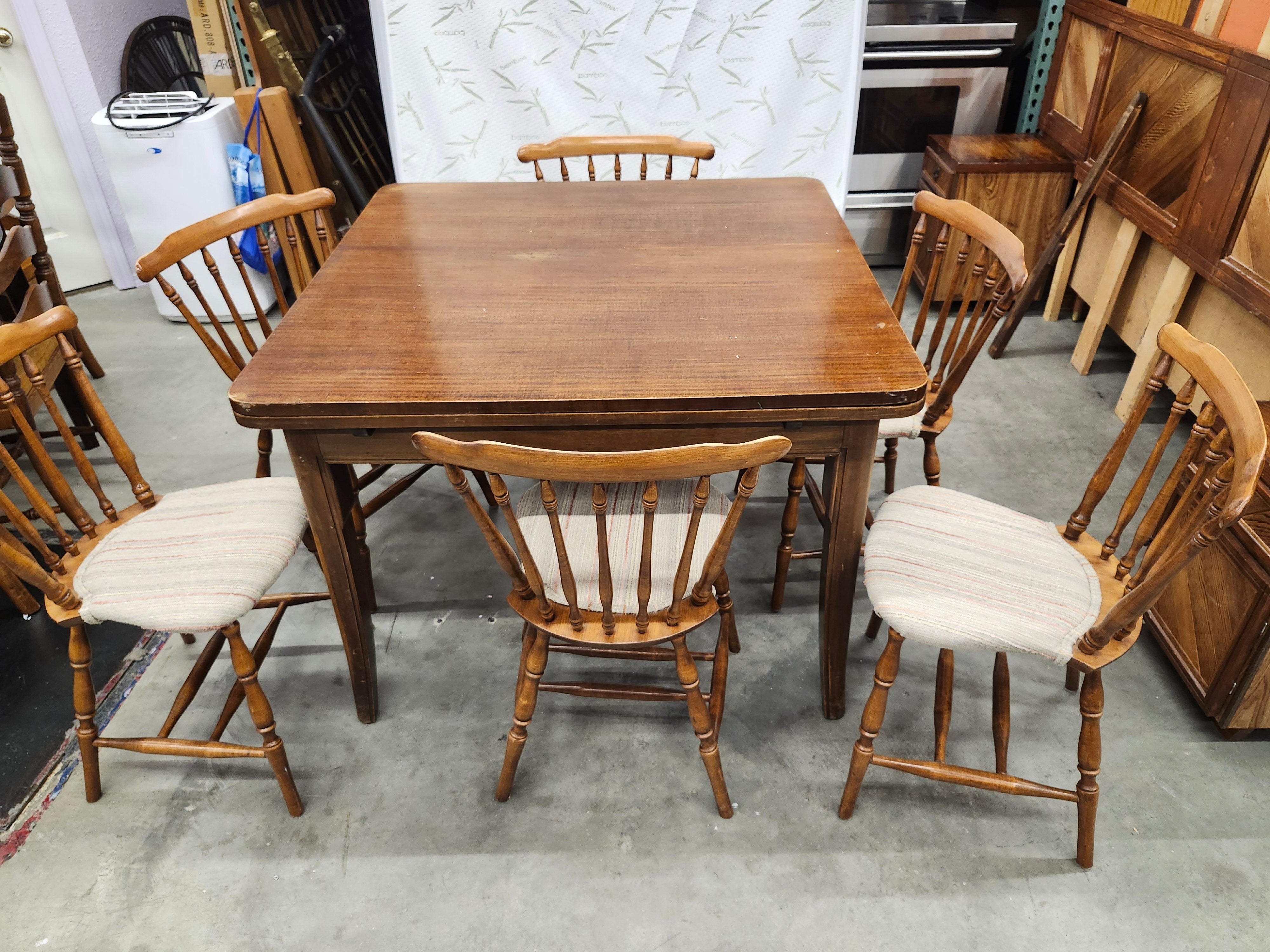 Dining set with 6 chairs and pull out sides to extend table