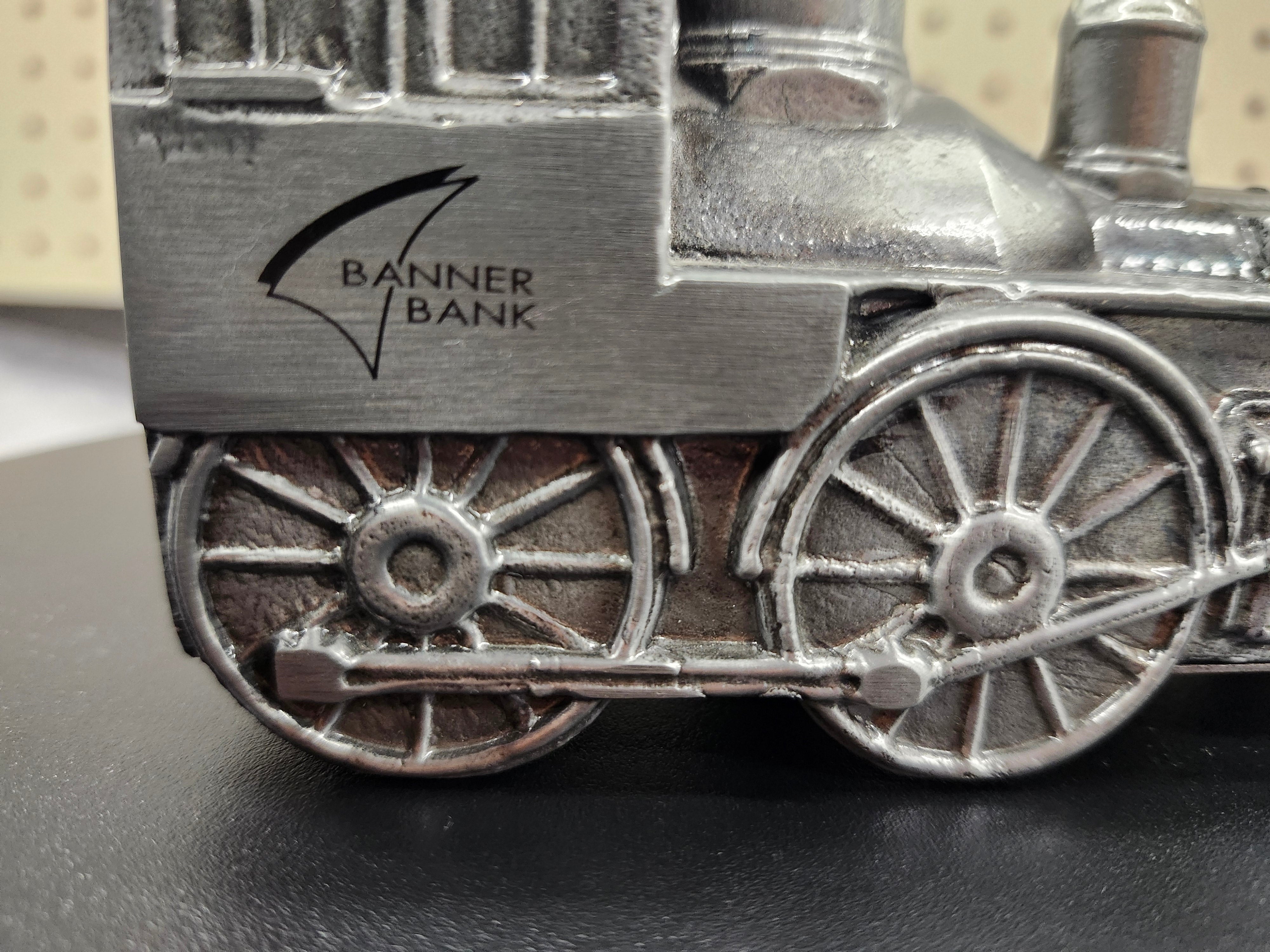 Metal train piggy bank