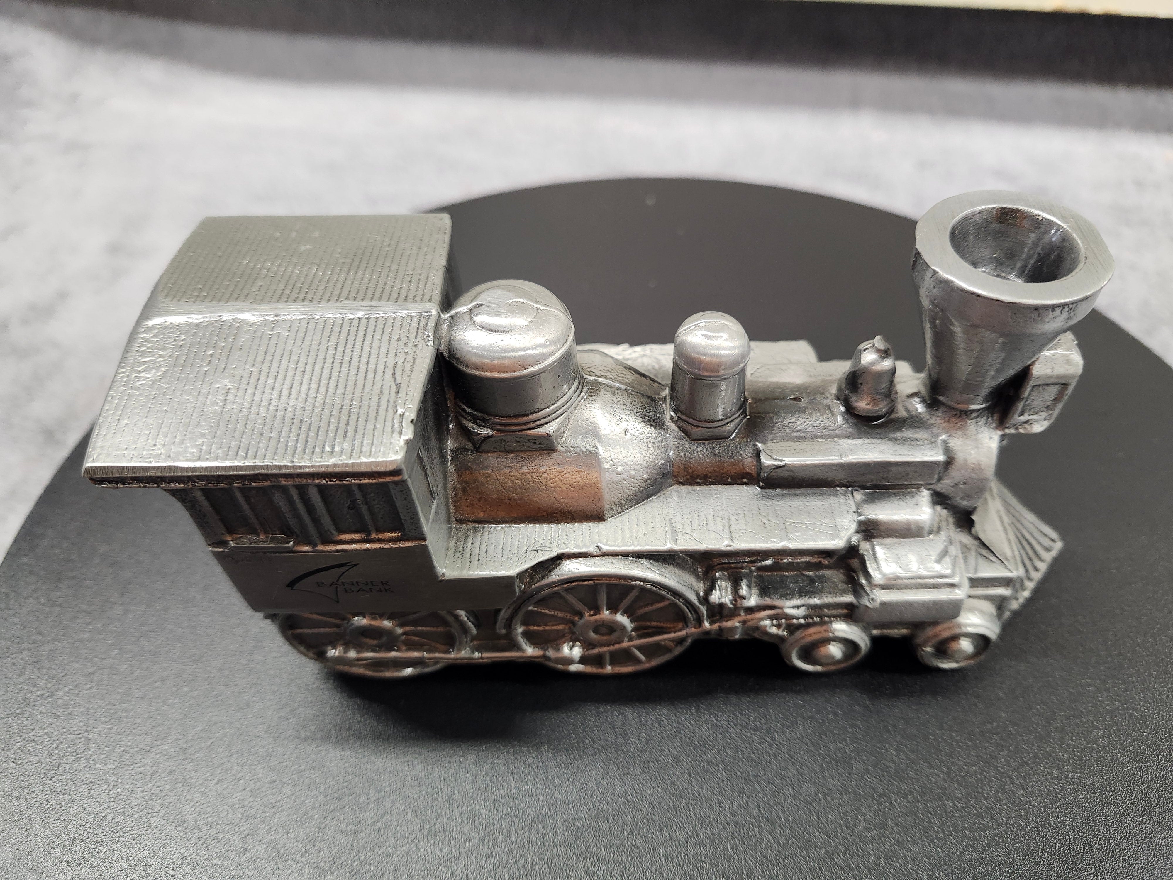 Metal train piggy bank