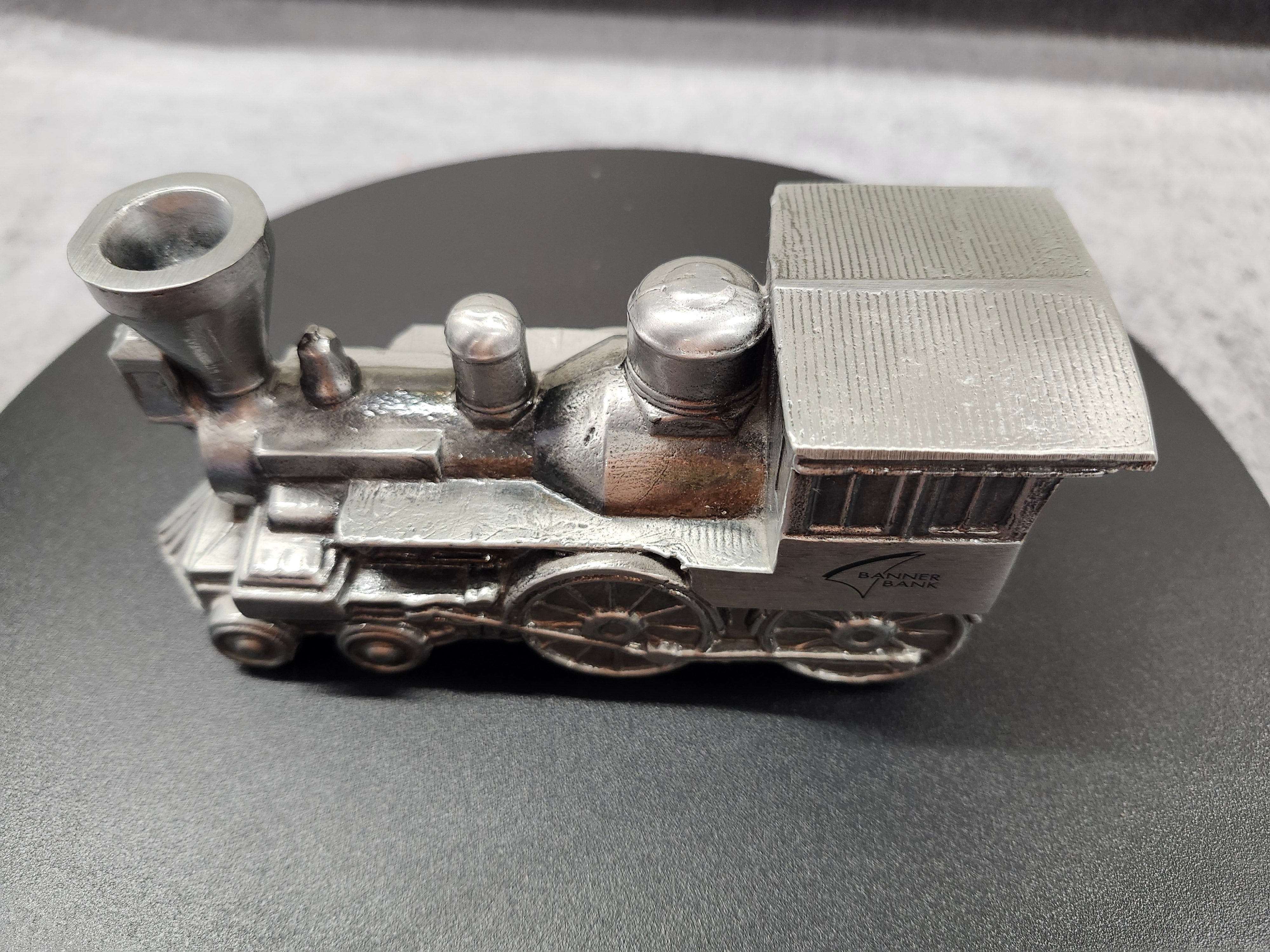 Metal train piggy bank