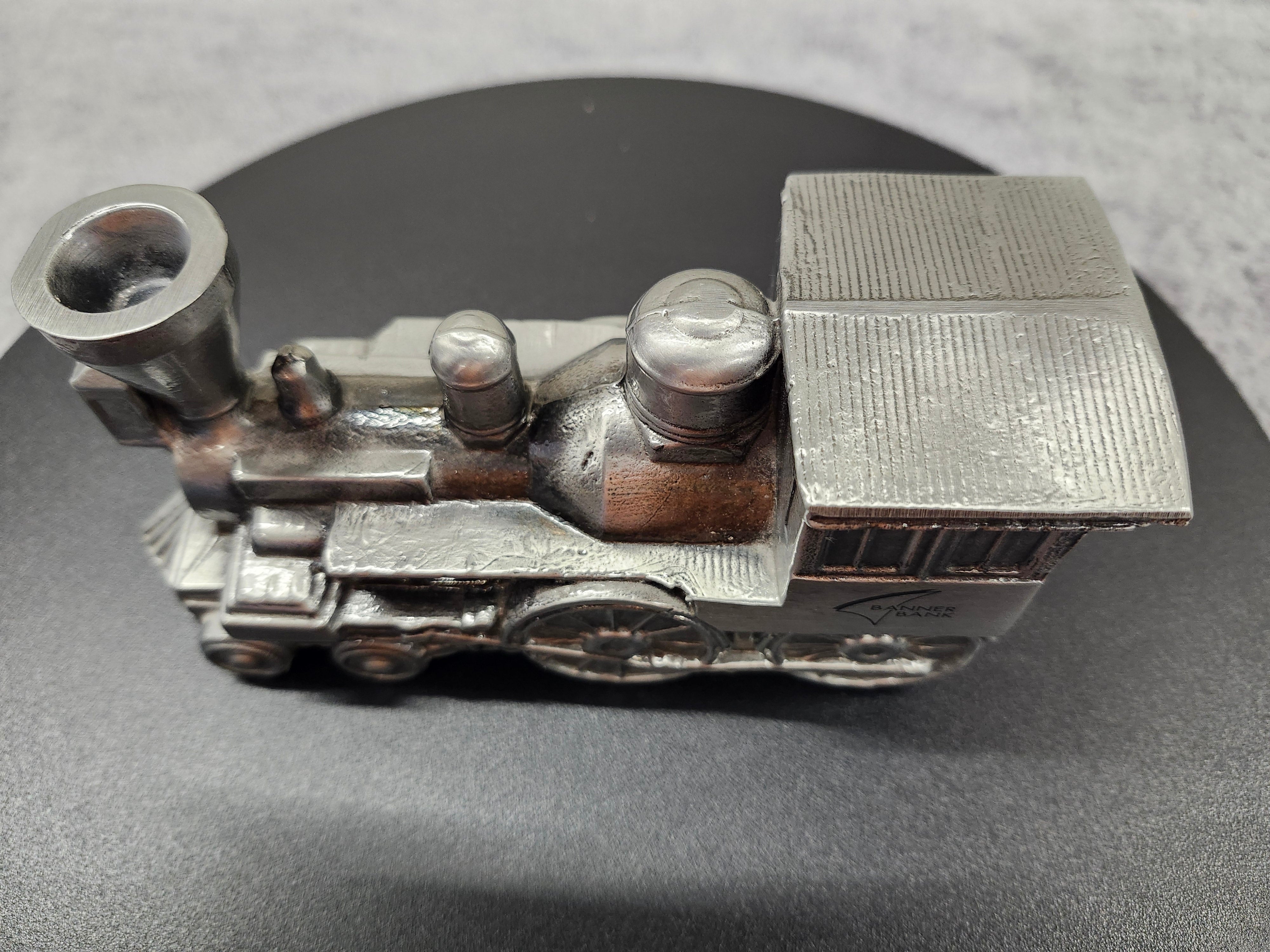 Metal train piggy bank