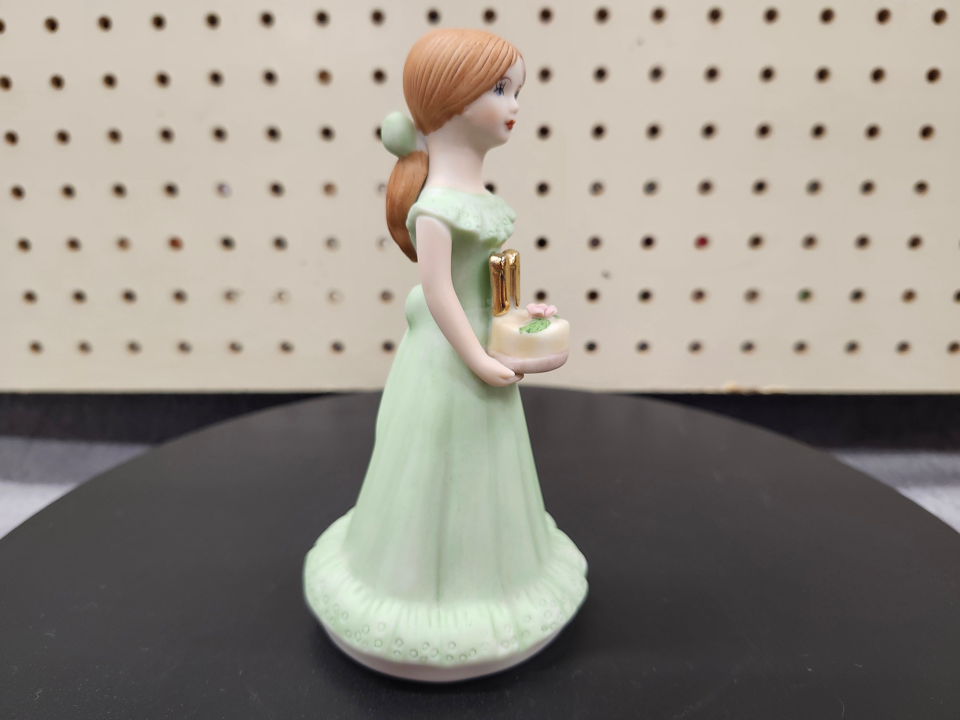 #11 Growing up birthday girl figurine