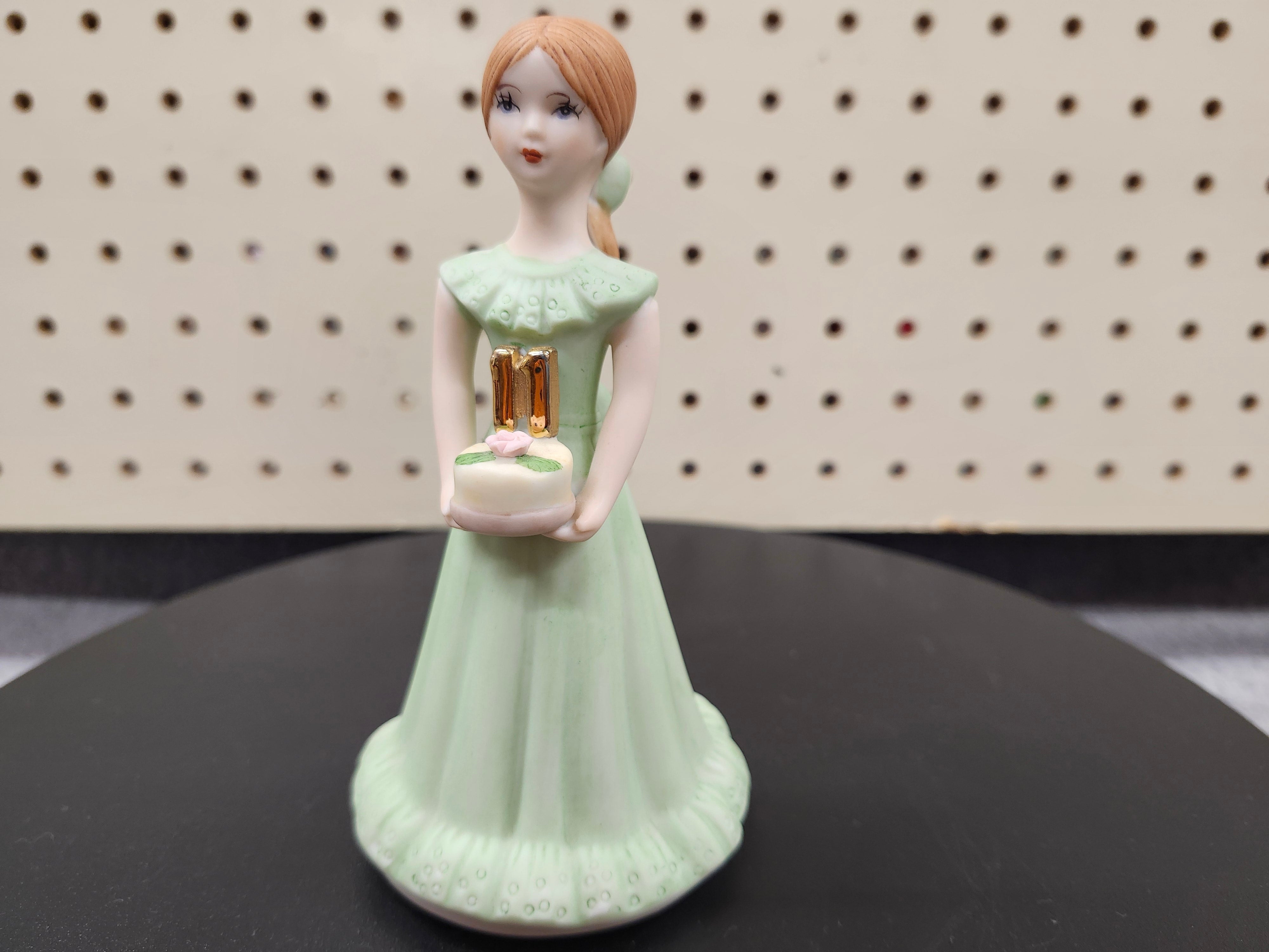 #11 Growing up birthday girl figurine