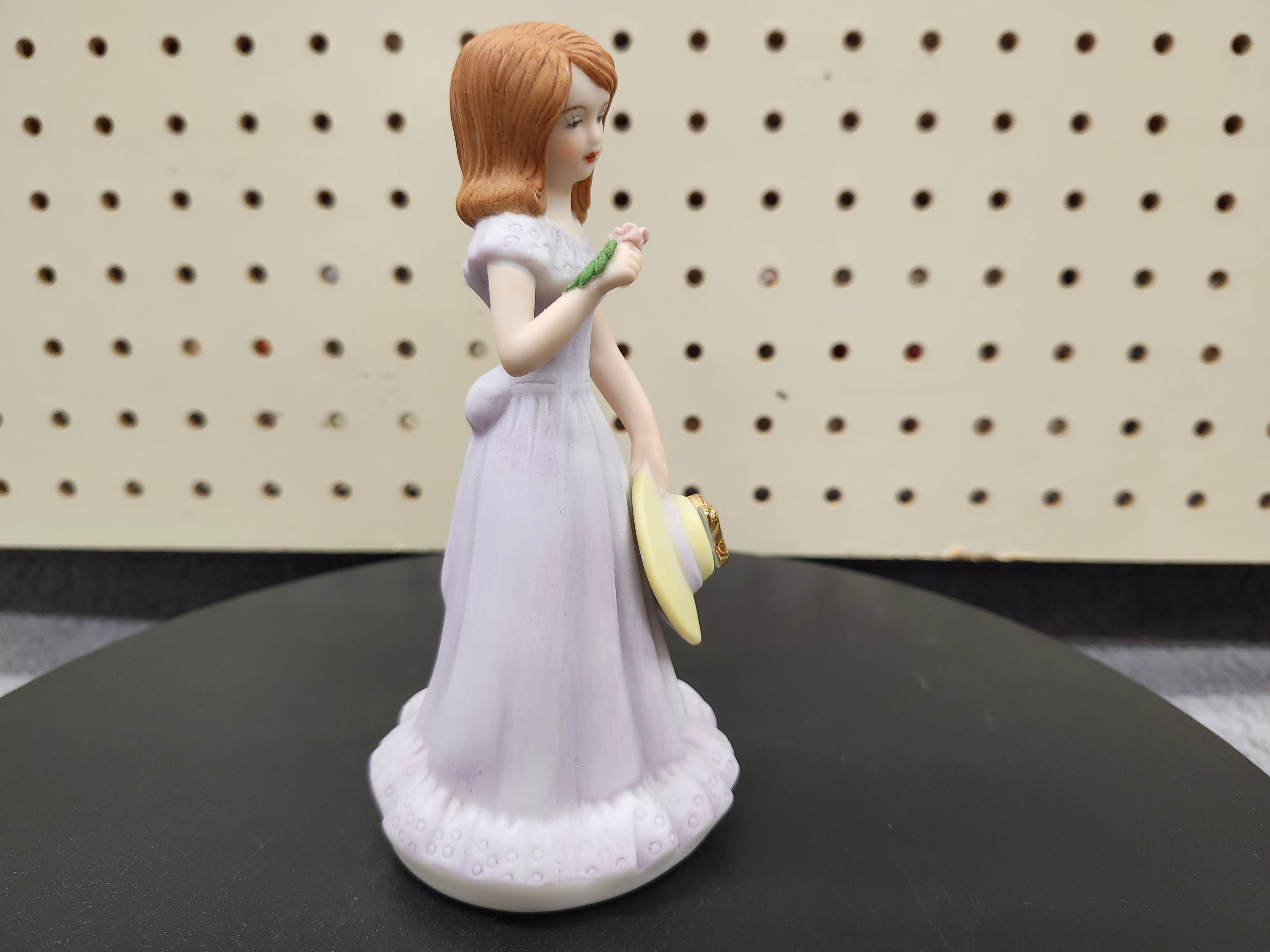 #12 Growing up birthday girl figurine