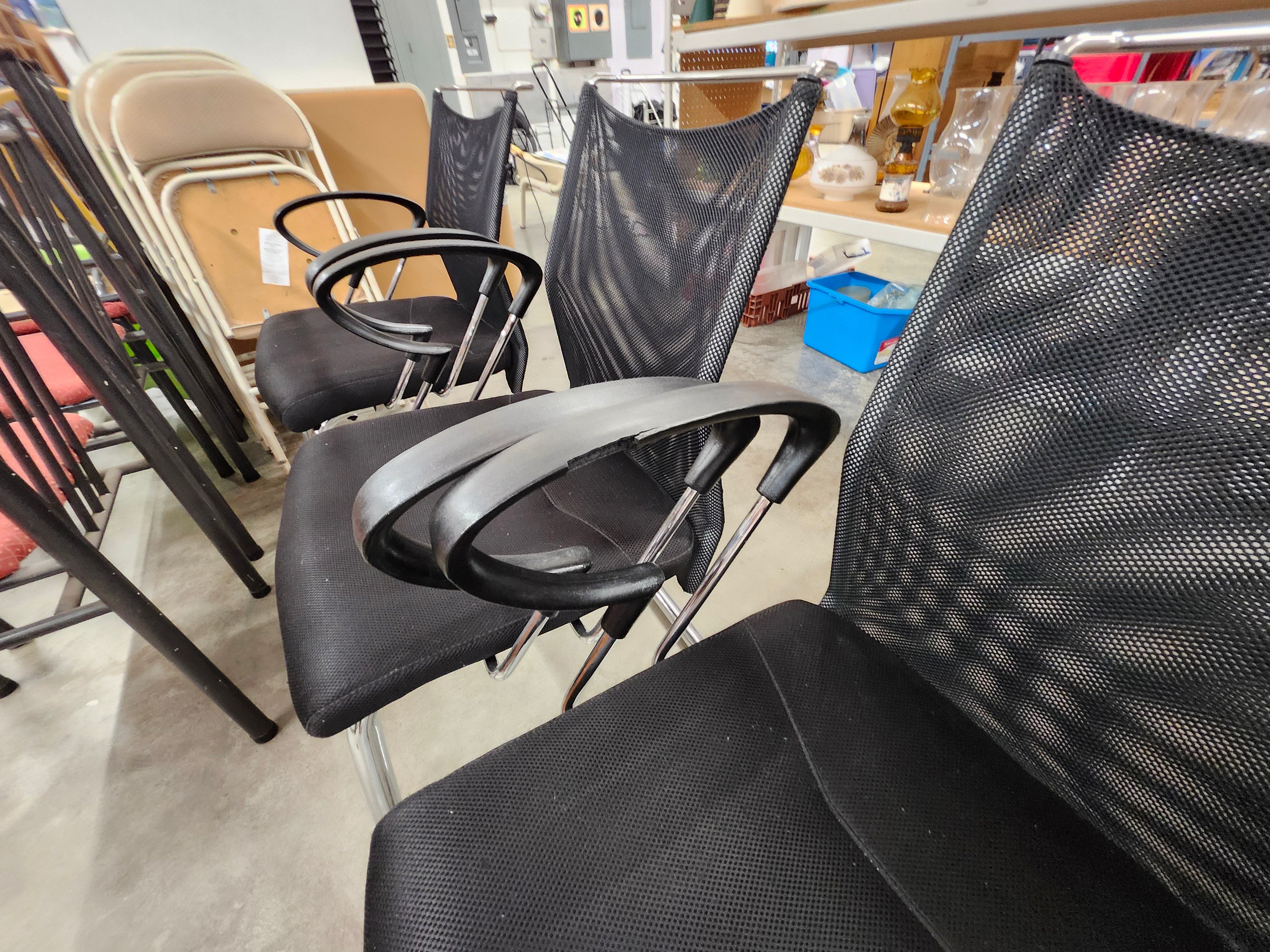 5 black office chairs