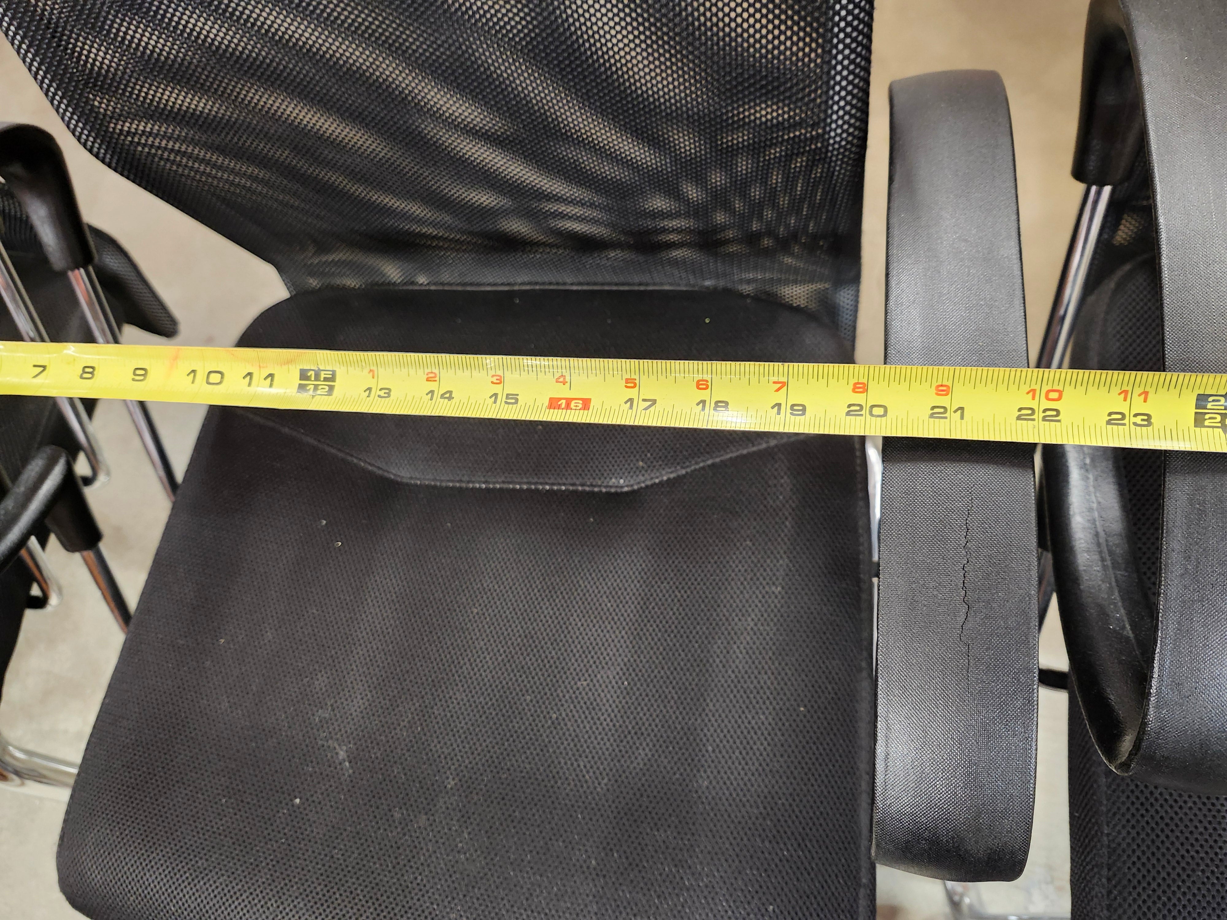 5 black office chairs