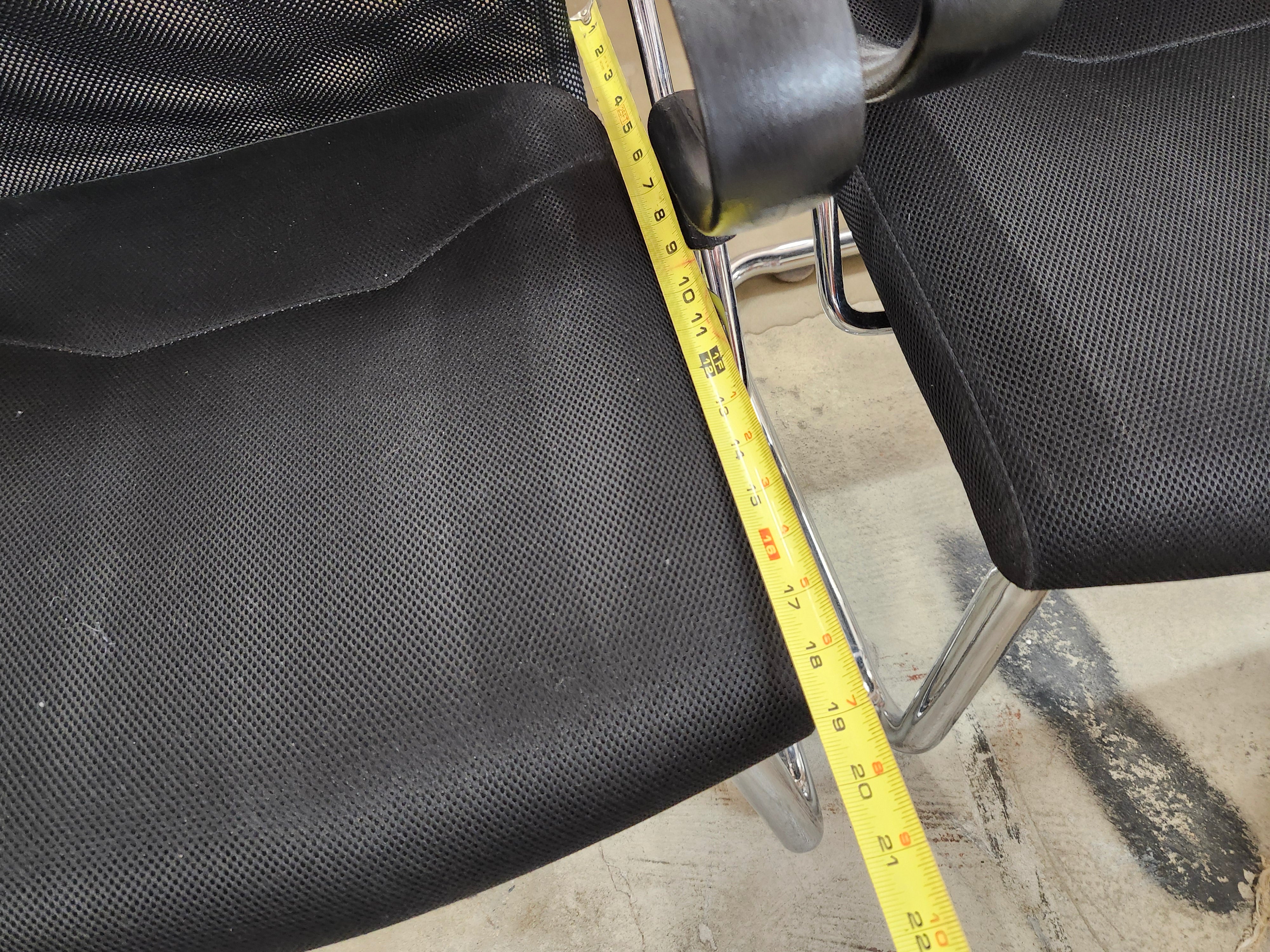 5 black office chairs