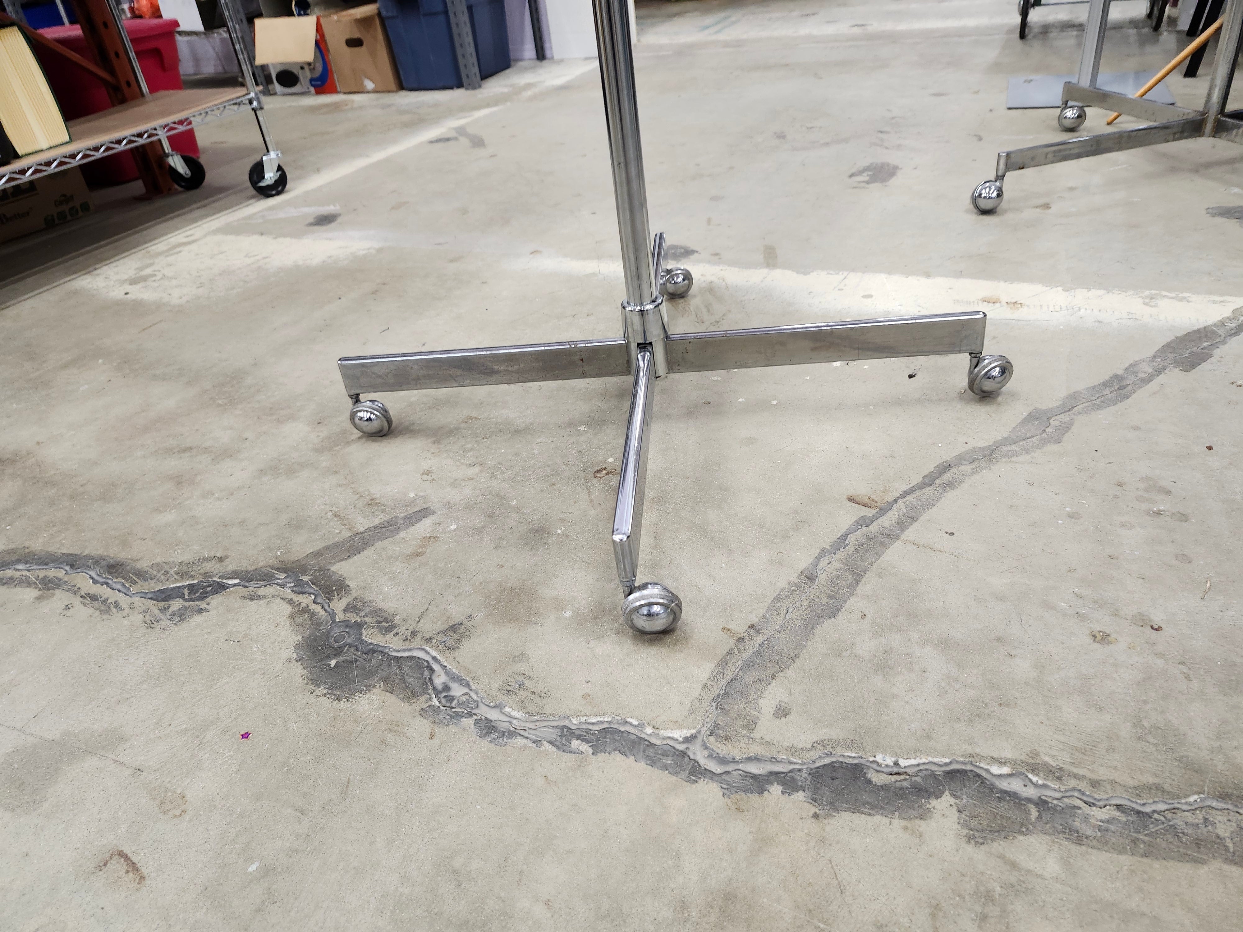 Clothing rack on wheels with hangers