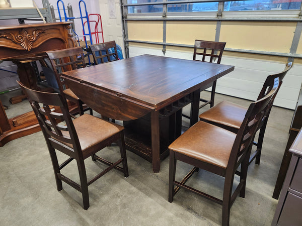 Dining set with 4 drop sides on each corner & 6 chairs with storage underneath table