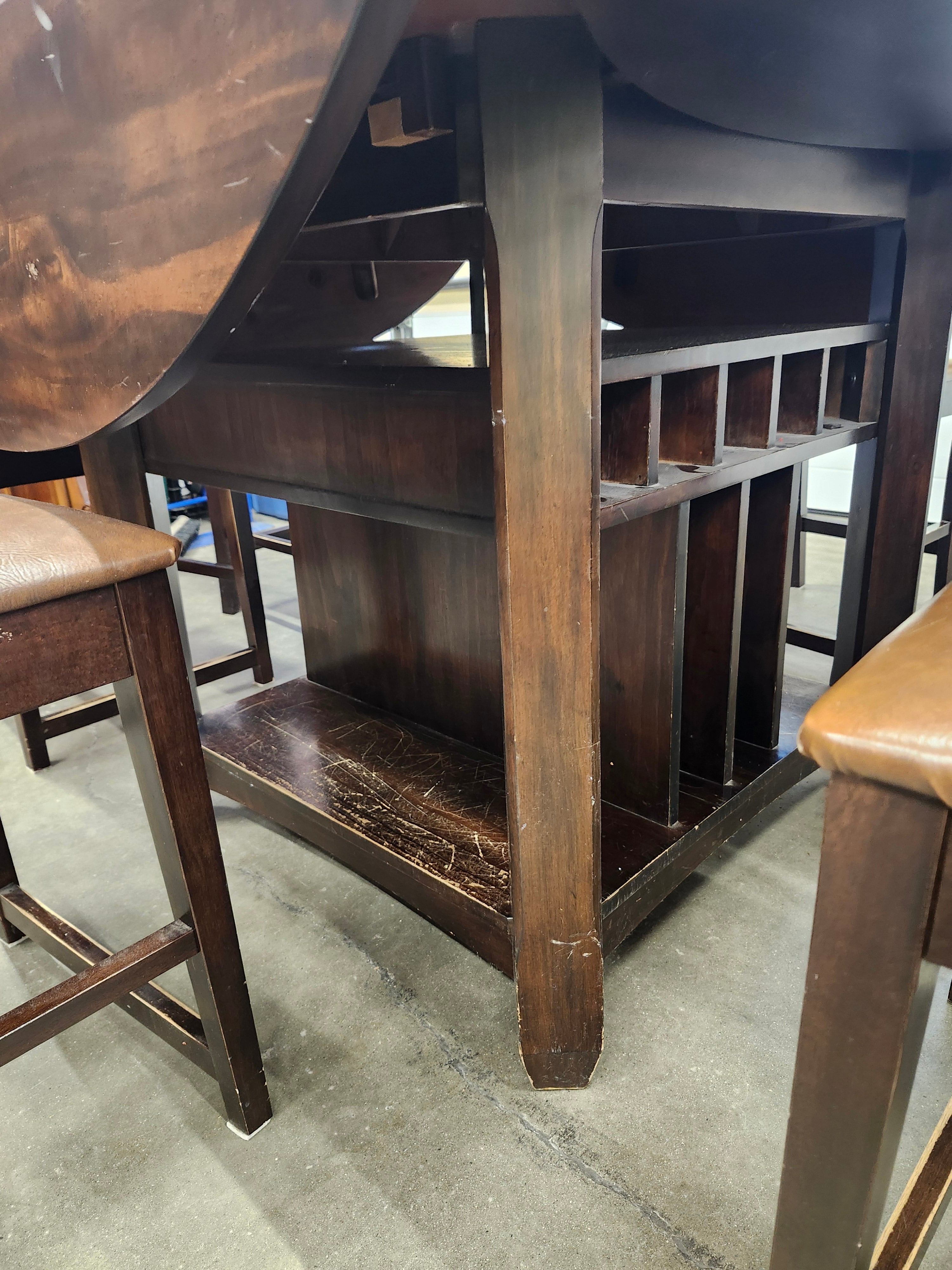 Dining set with 4 drop sides on each corner & 6 chairs with storage underneath table