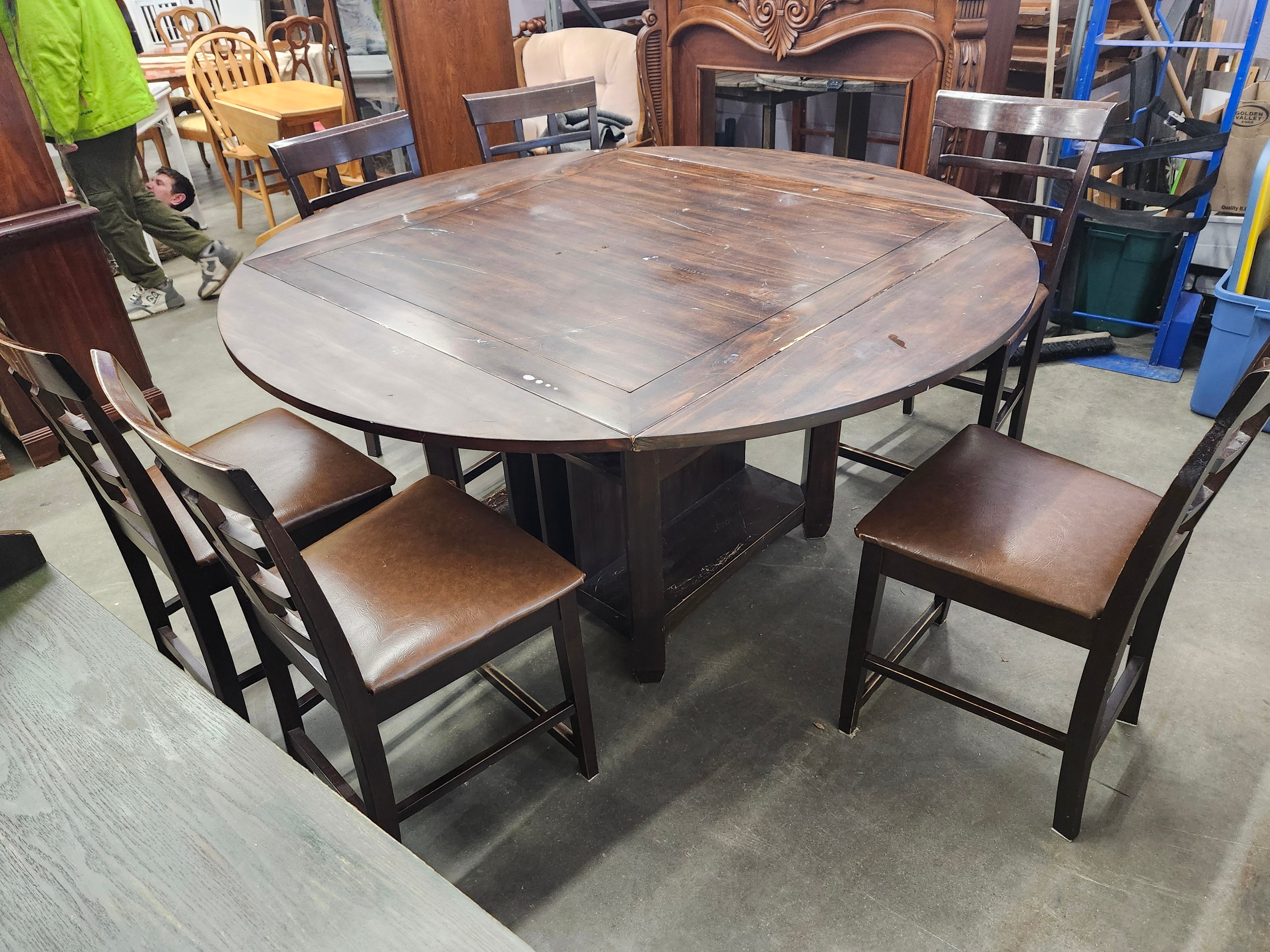 Dining set with 4 drop sides on each corner & 6 chairs with storage underneath table