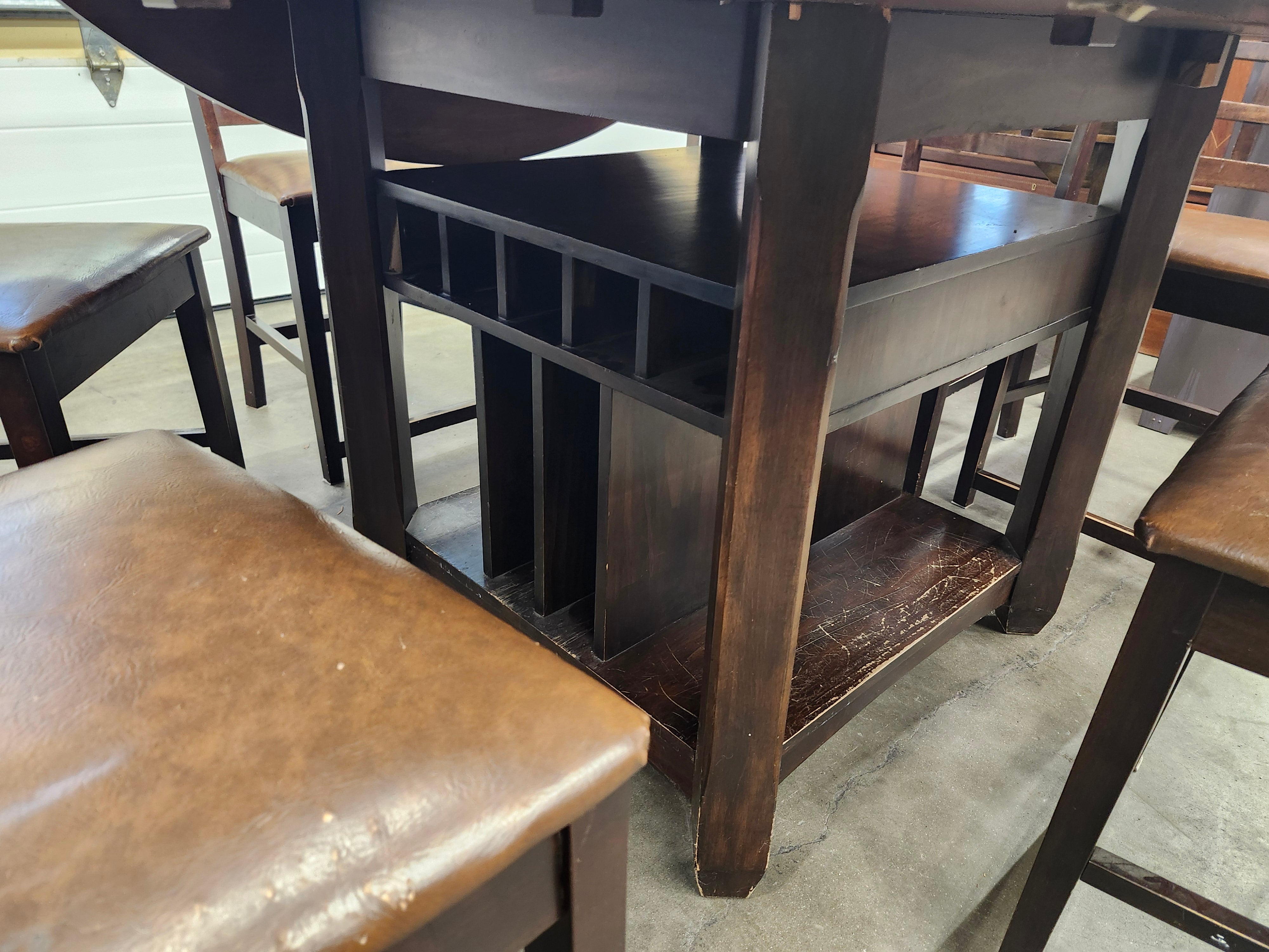 Dining set with 4 drop sides on each corner & 6 chairs with storage underneath table