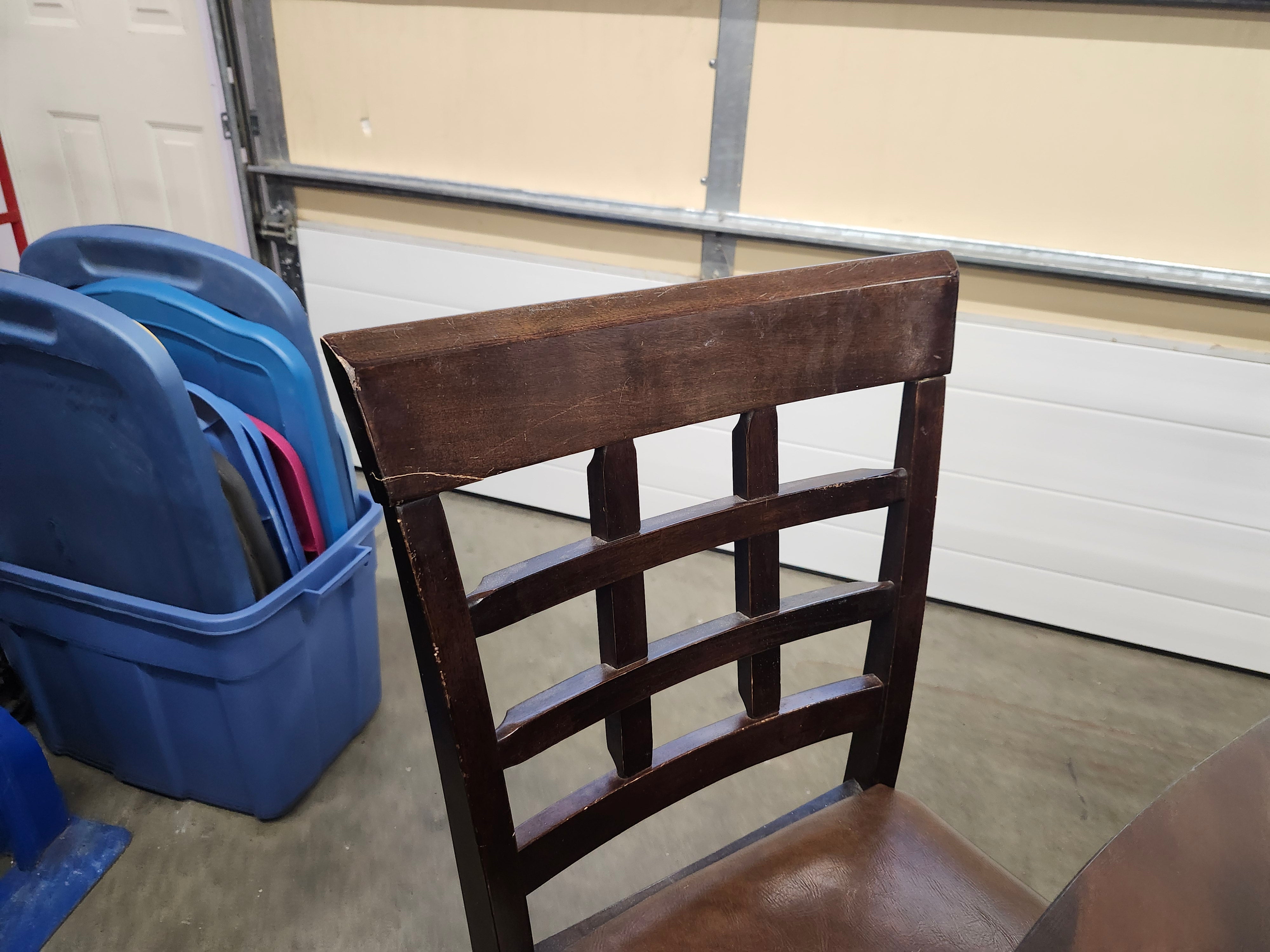 Dining set with 4 drop sides on each corner & 6 chairs with storage underneath table