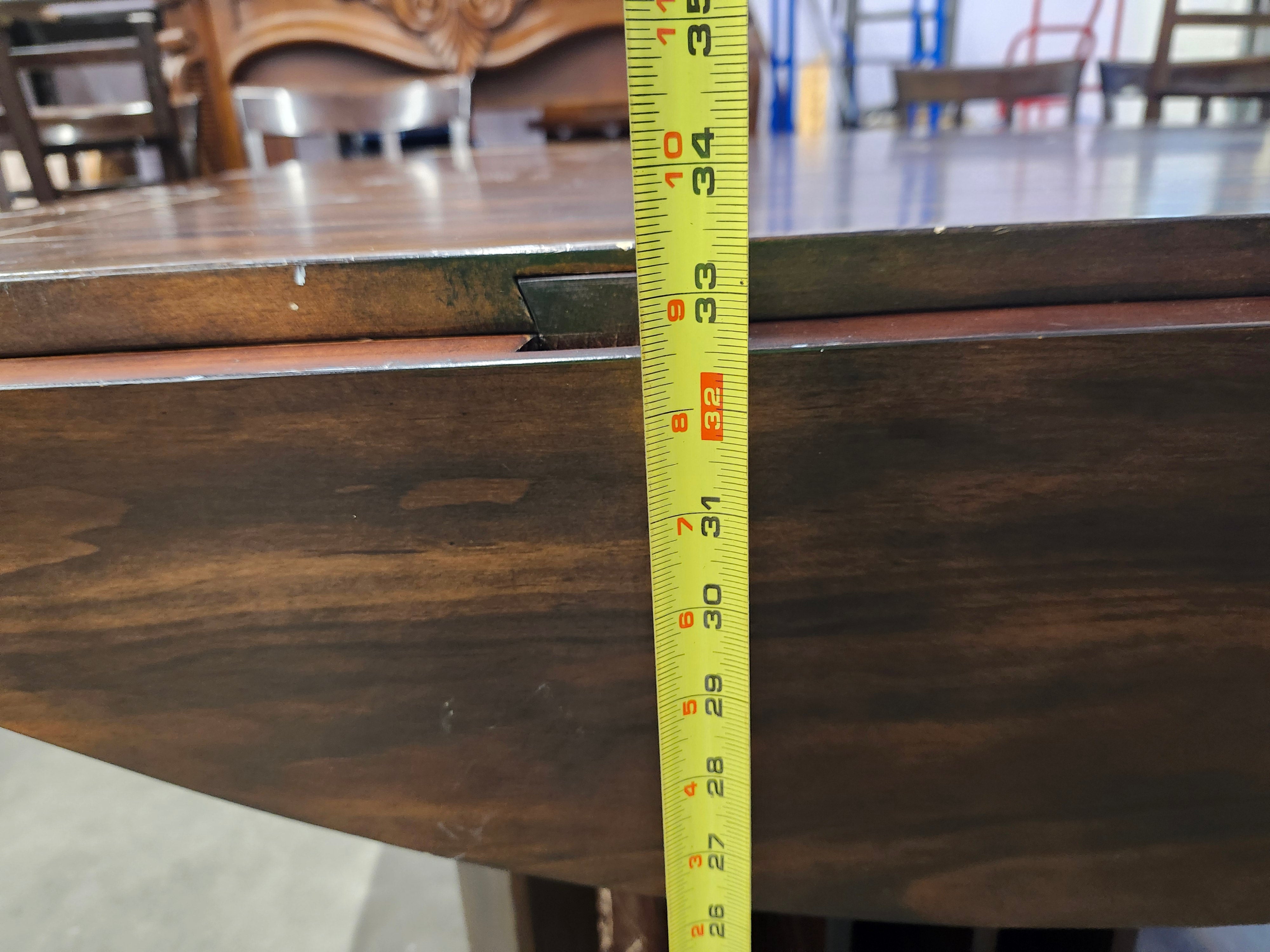 Dining set with 4 drop sides on each corner & 6 chairs with storage underneath table