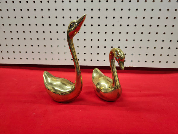 Brass swans