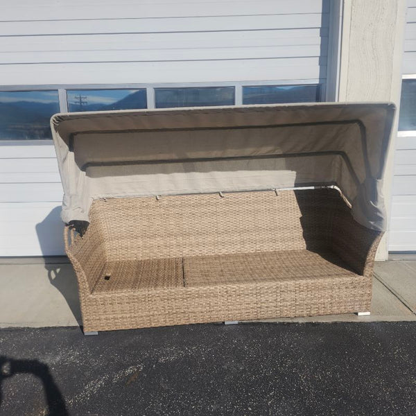 Patio couch with awning